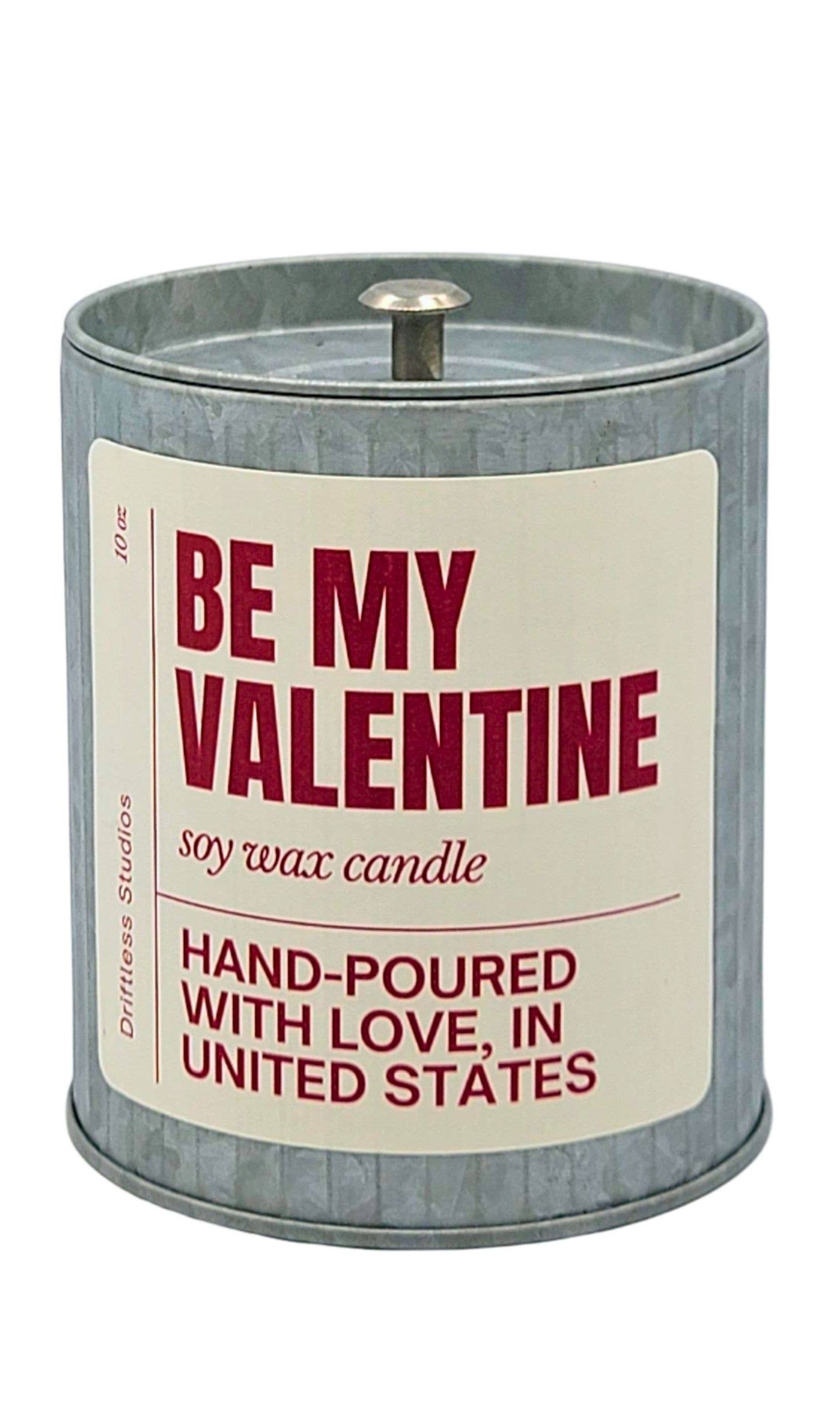 Candle in a tin with 'Be My Valentine' text on a white background