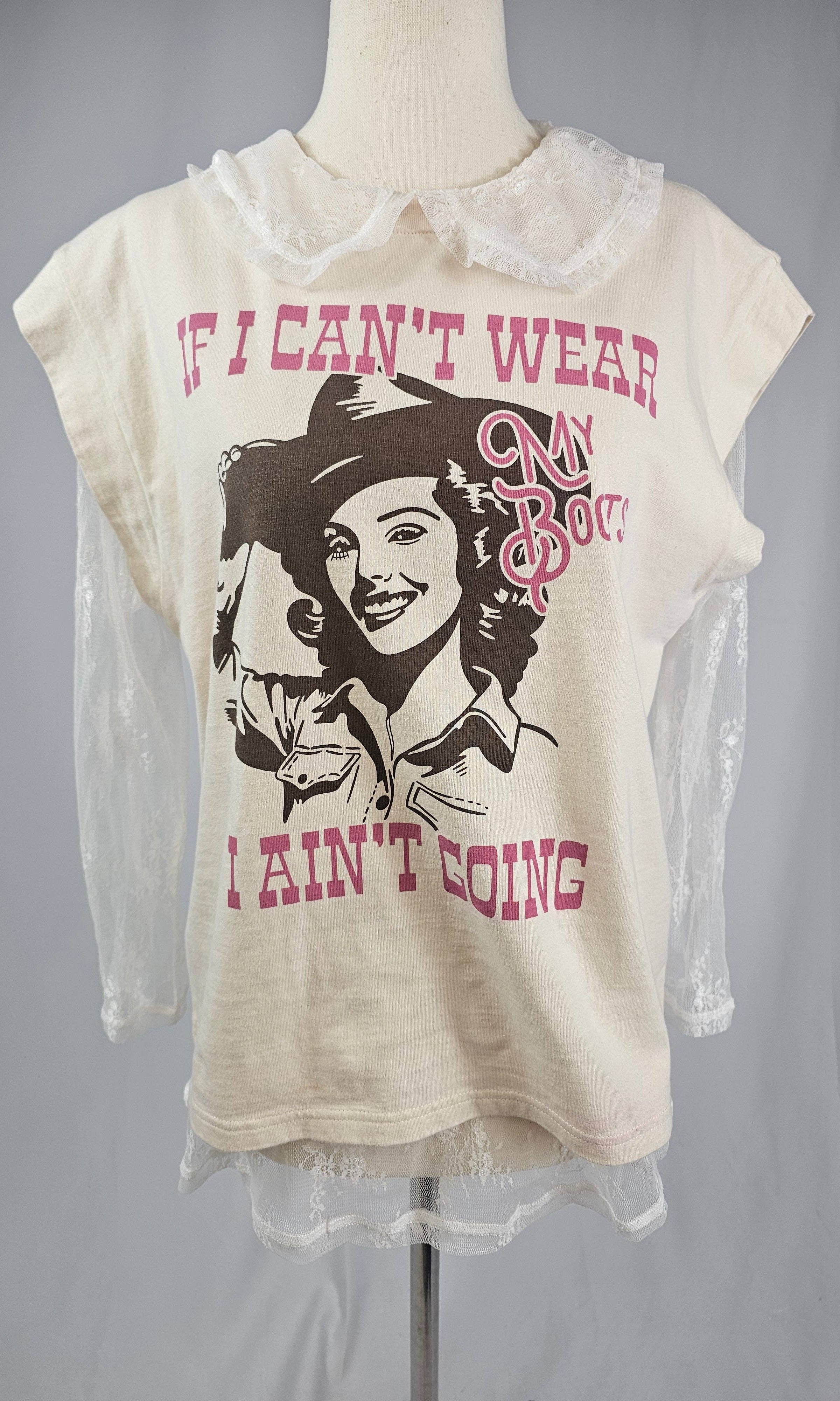 T-shirt with graphic design and text on a mannequin against a gray background