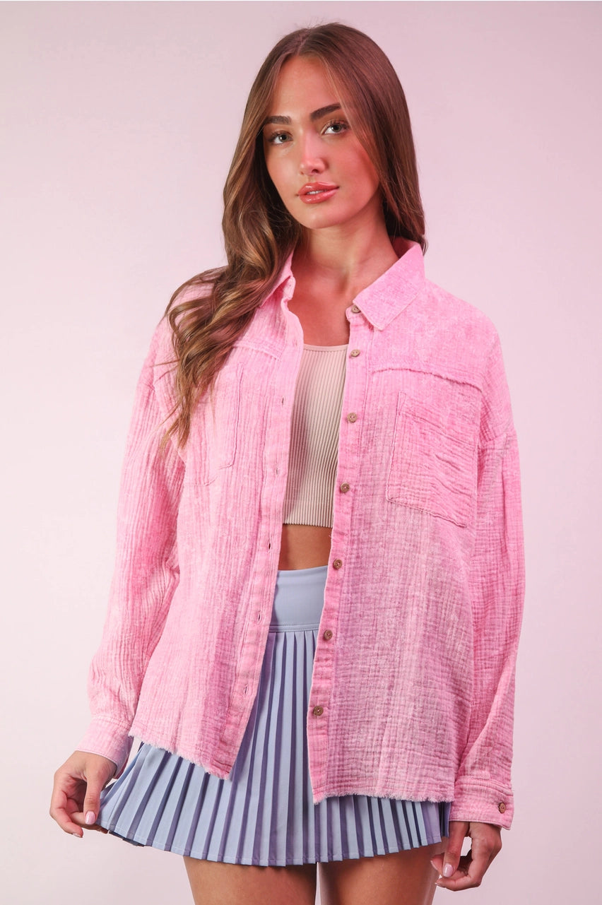 Front view pink mineral-washed gauze button down with patch pockets and frayed hi-lo hem.