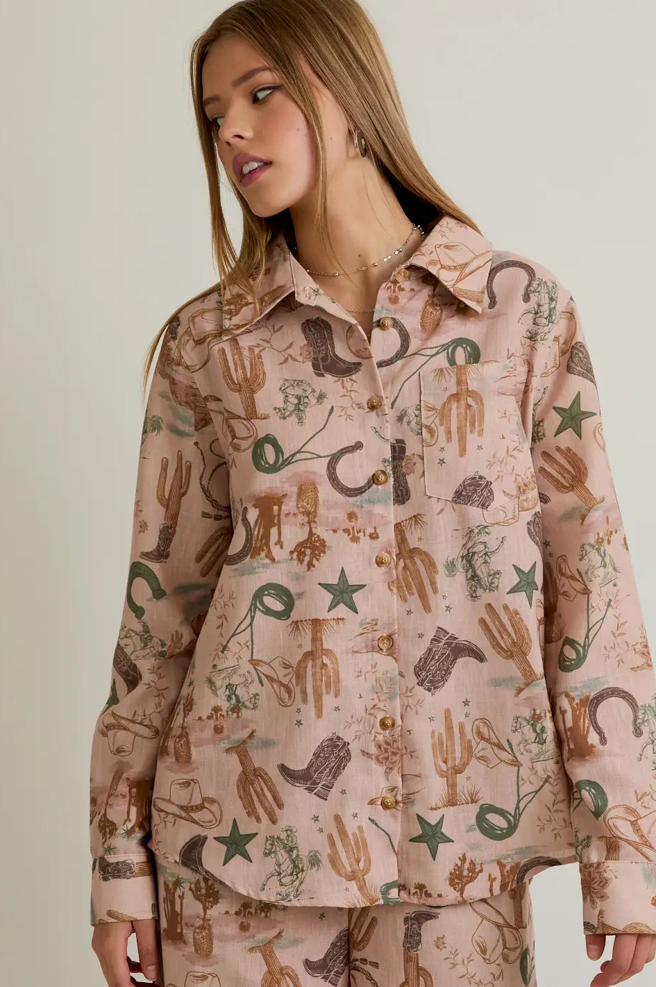 Desert Rose Western-print button-up blouse in blush—front view