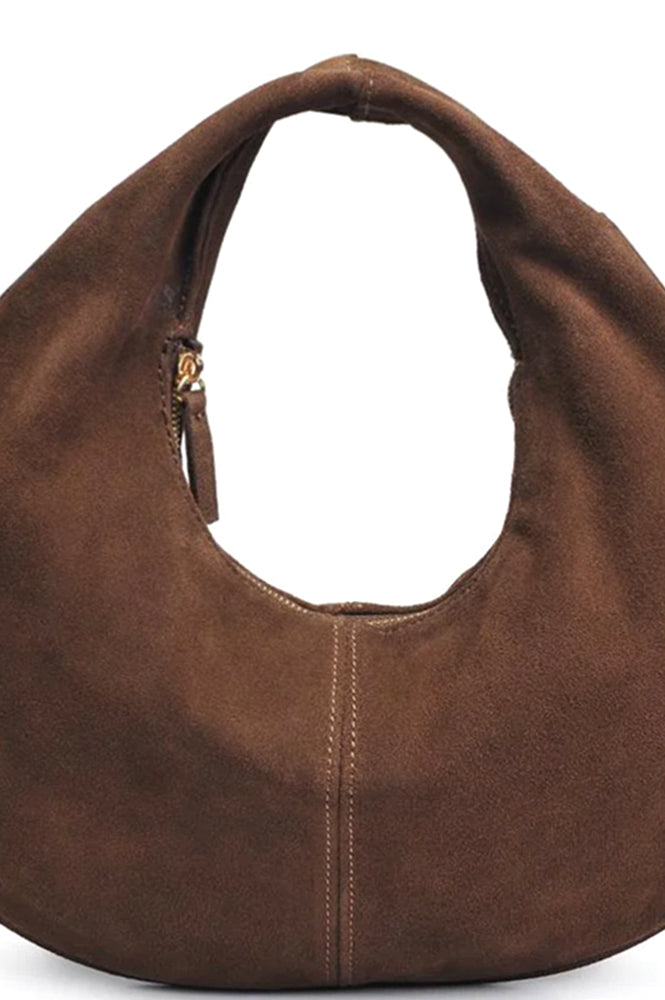 Brown suede kidney handbag on a white background