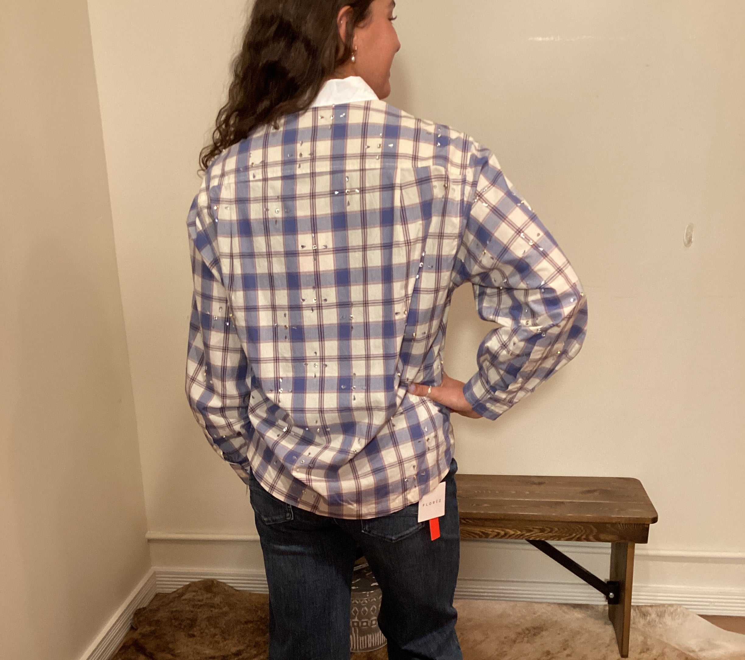 Blue and white plaid button up shirt with a white color and crystals on it