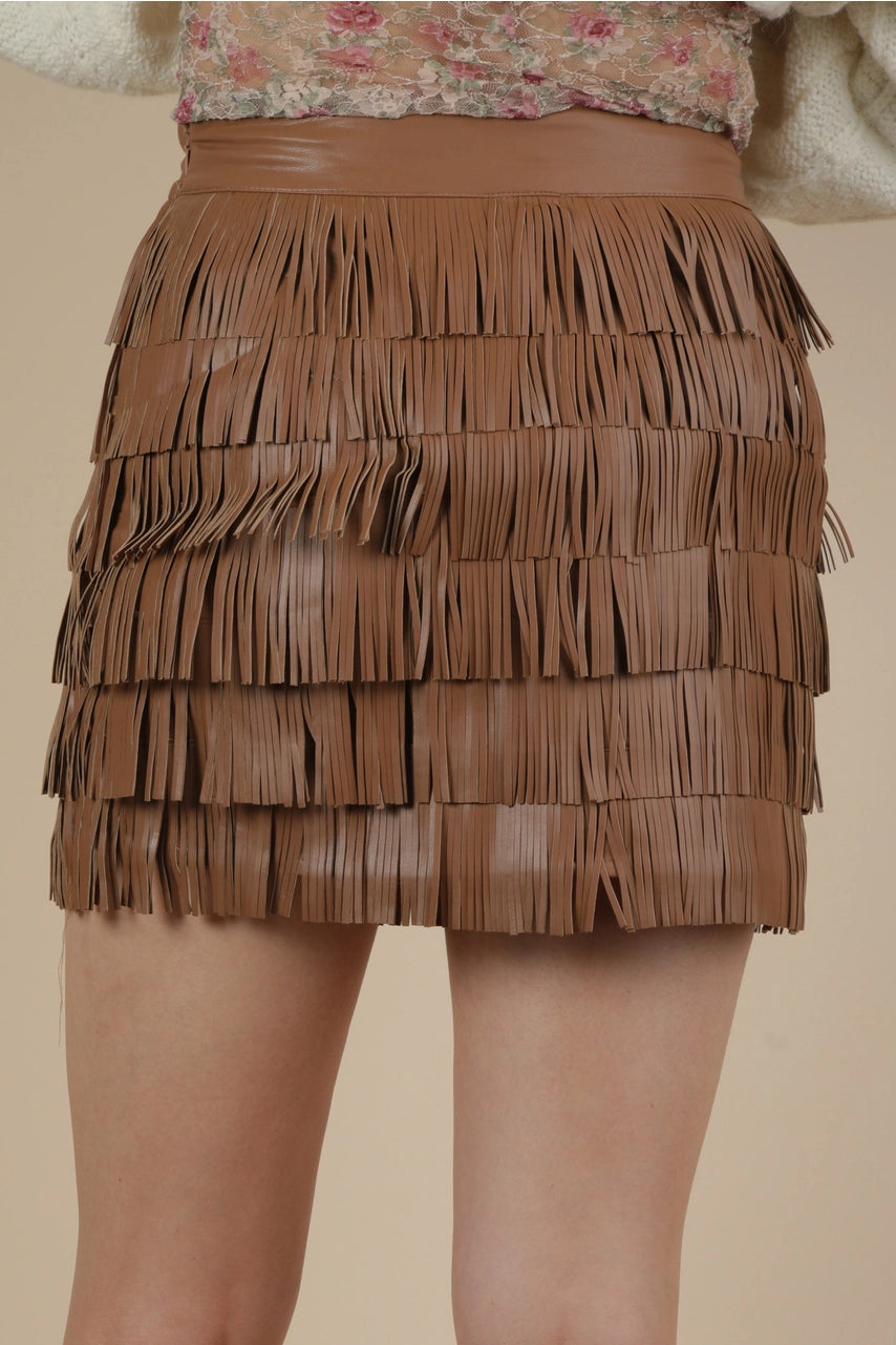 Brown faux leather fringe mini skirt, back view showing layered tiers
