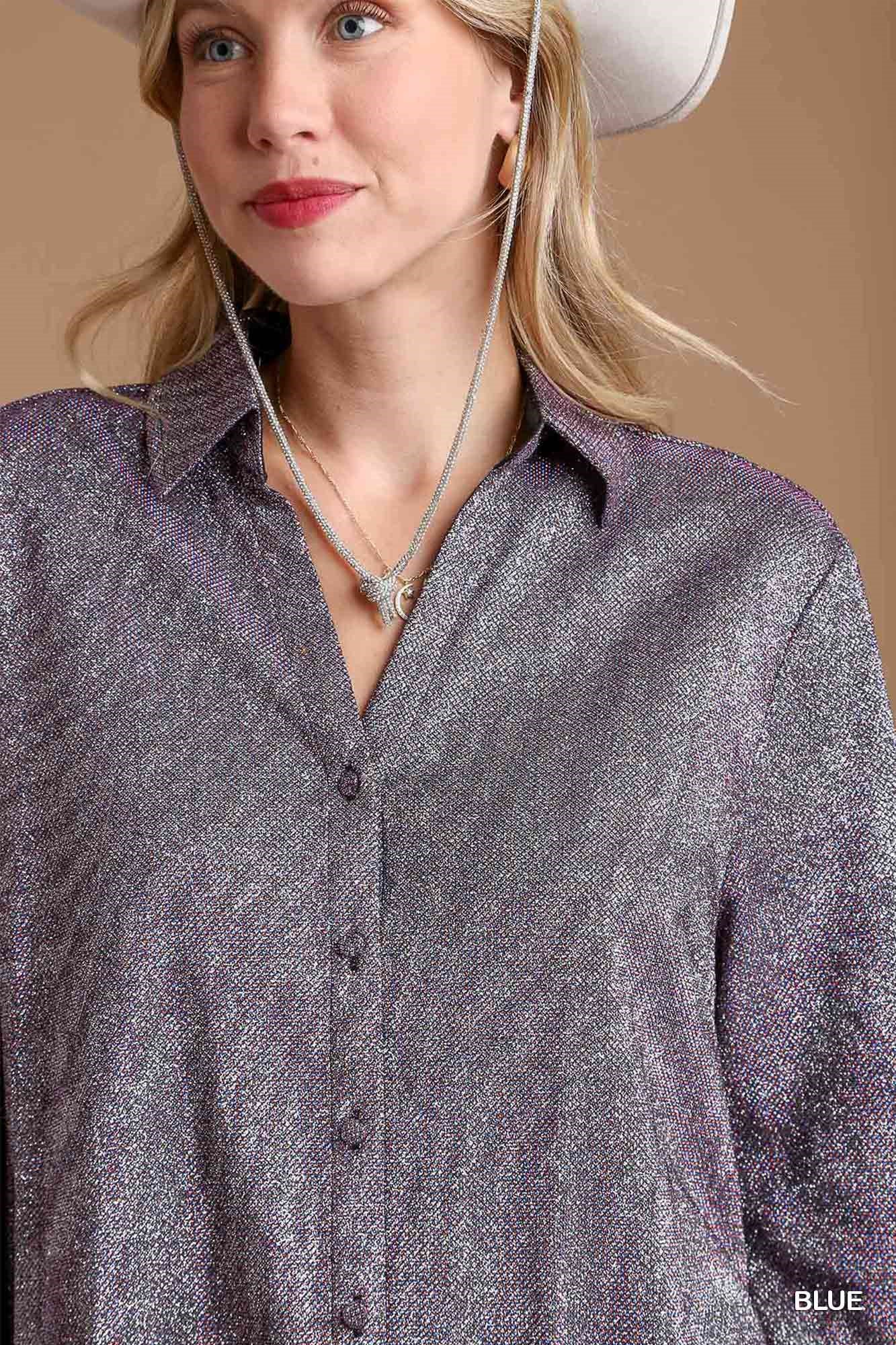 Woman wearing a gray button-up shirt and white cowboy hat against a beige background