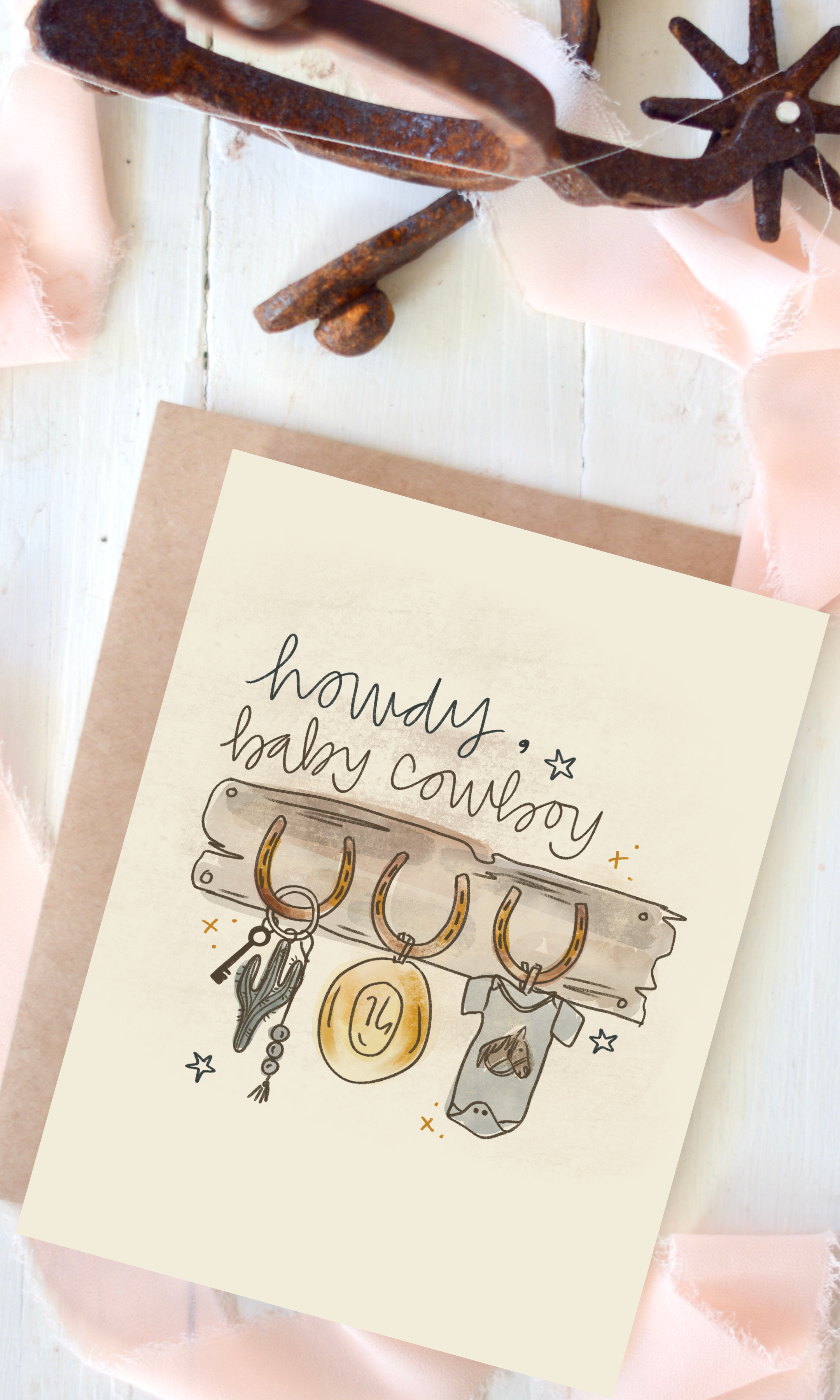 Card with 'howdy, baby cowboy' text and illustrations on a white background