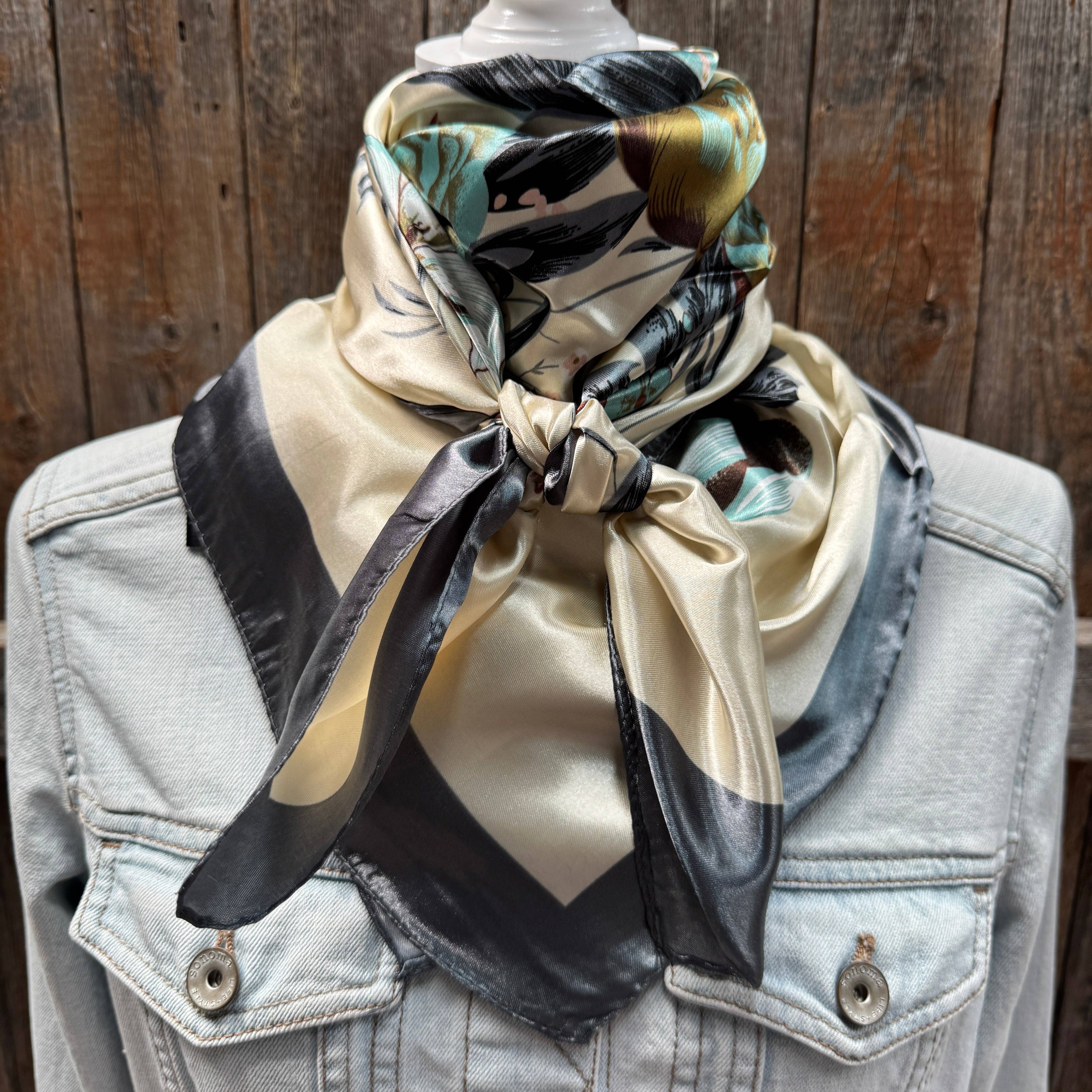 Person wearing a floral scarf on a wooden background