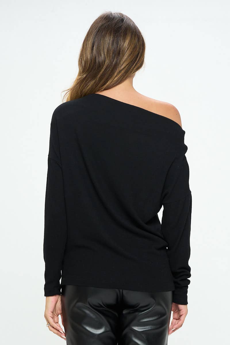Back of Black off-shoulder top worn by a person on a white background
