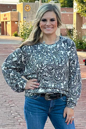 Black and white toole pattern on a ribbed long sleeve top