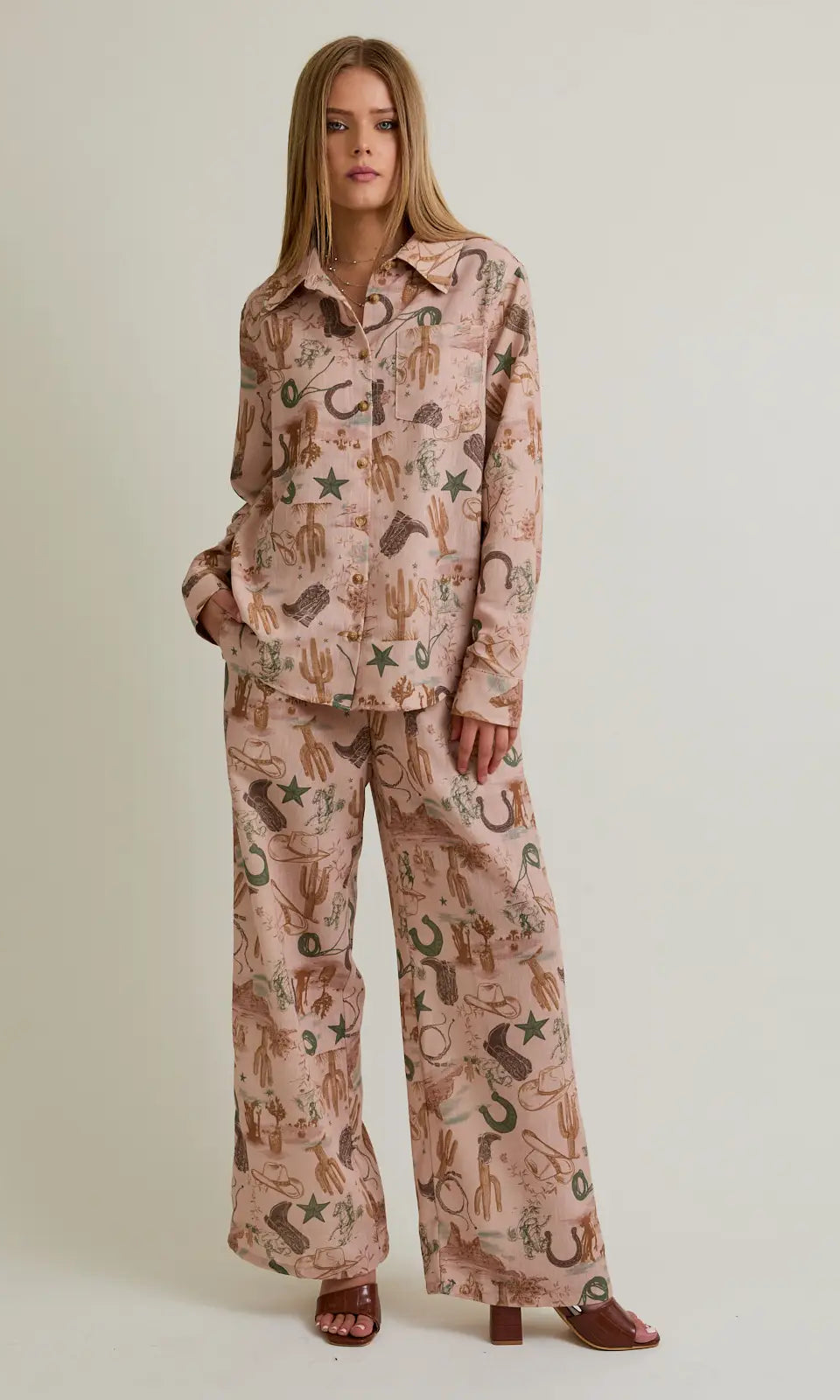 Desert Rose western-print wide-leg pants in blush with elastic waistband—front view
