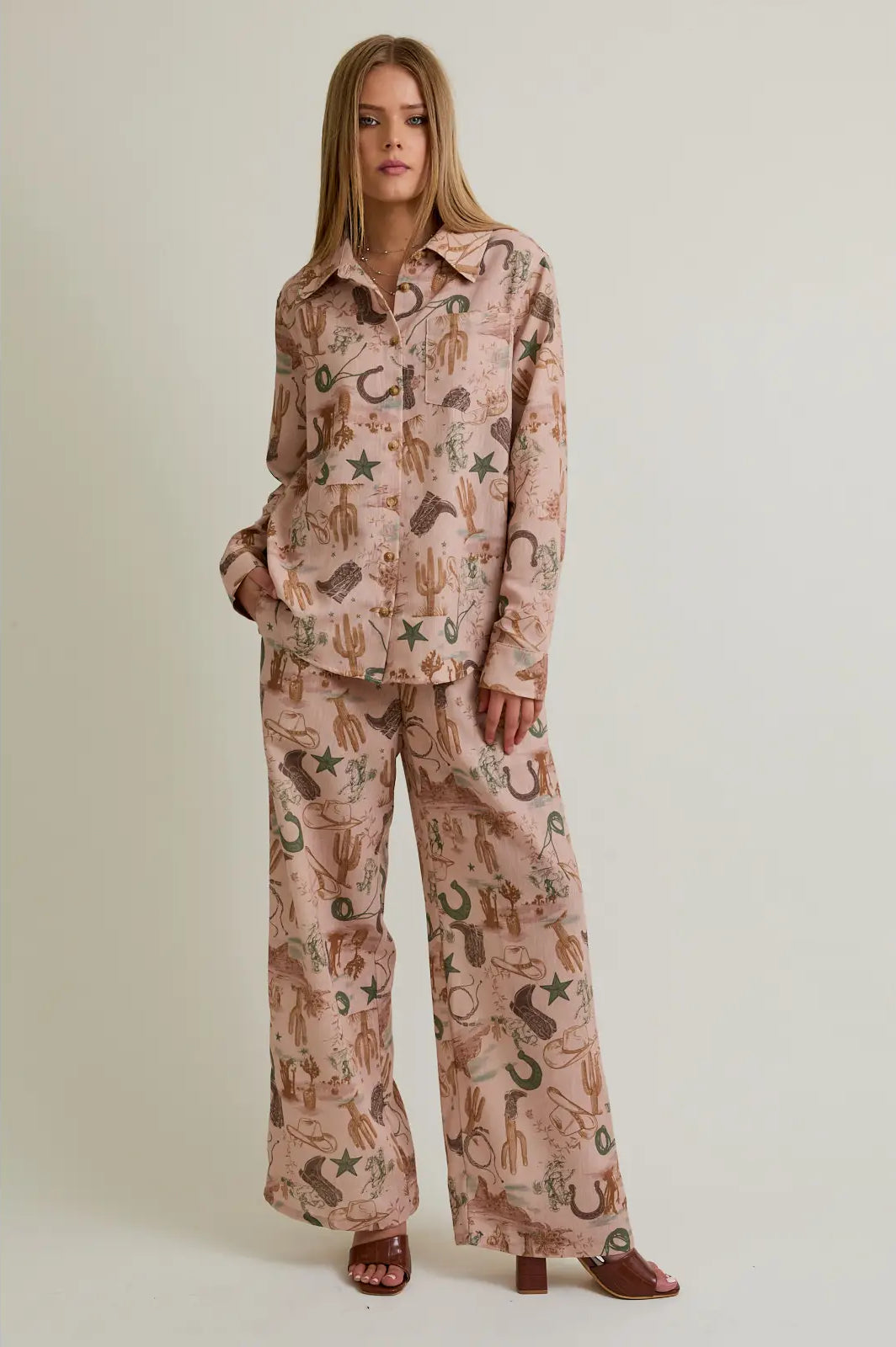Desert Rose western-print wide-leg pants in blush with elastic waistband—front view