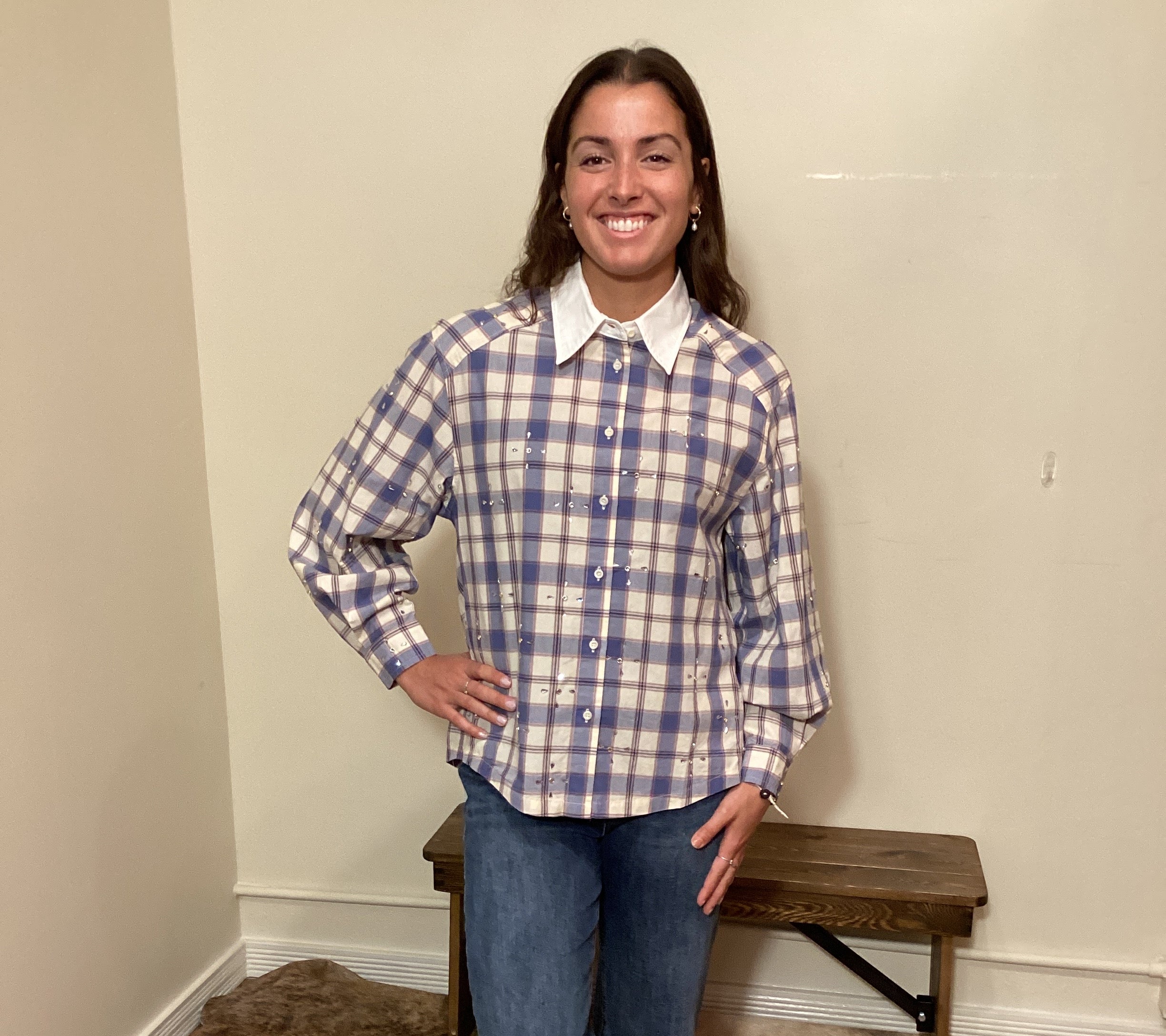 Blue and white plaid button up shirt with a white color and crystals on it