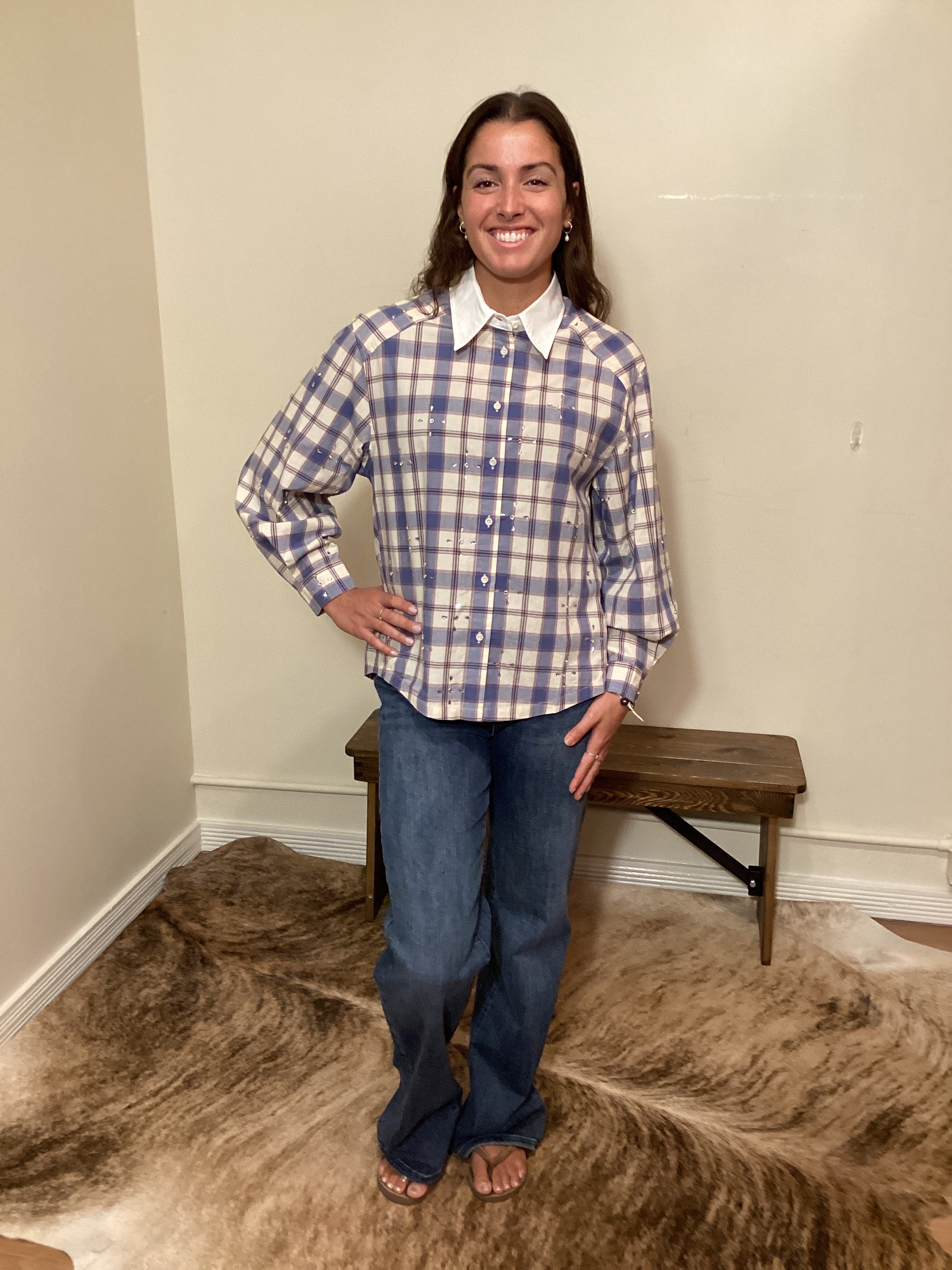 Blue and white plaid button up shirt with a white color and crystals on it