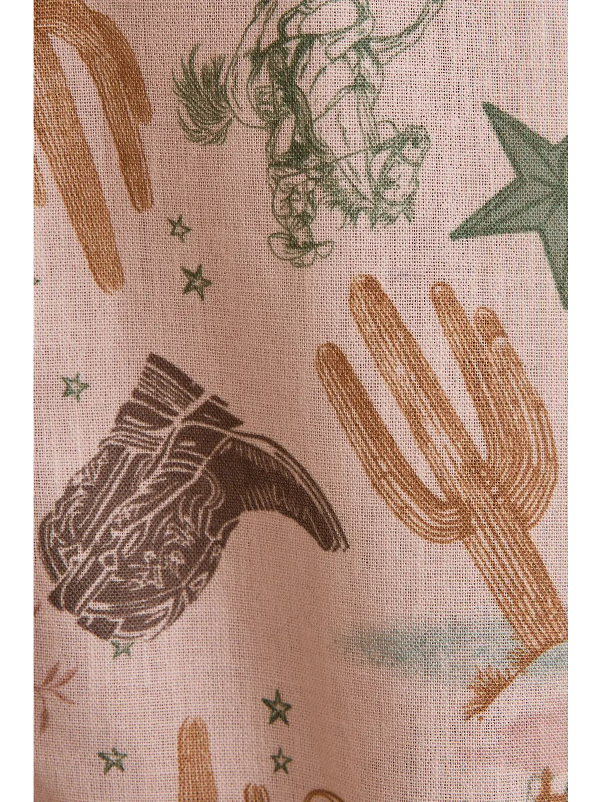Close-up of cacti, boots, horseshoes, lasso, stars print—Desert Rose blouse