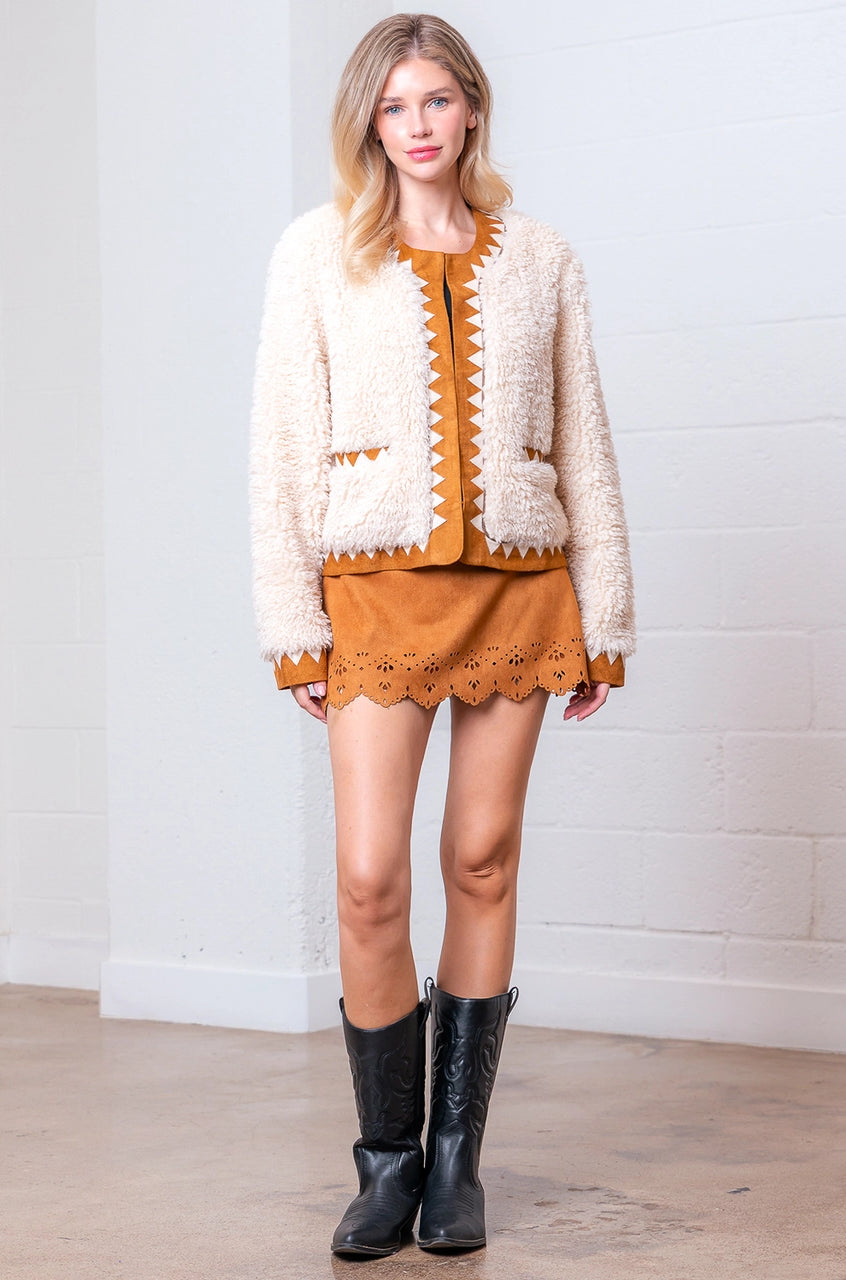 Front view of taupe Western sherpa jacket with zig-zag faux-suede trim on model