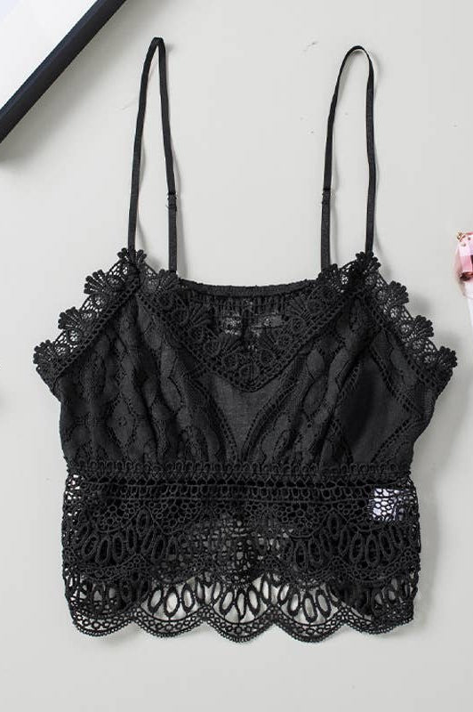 Black lace cami laying on a table