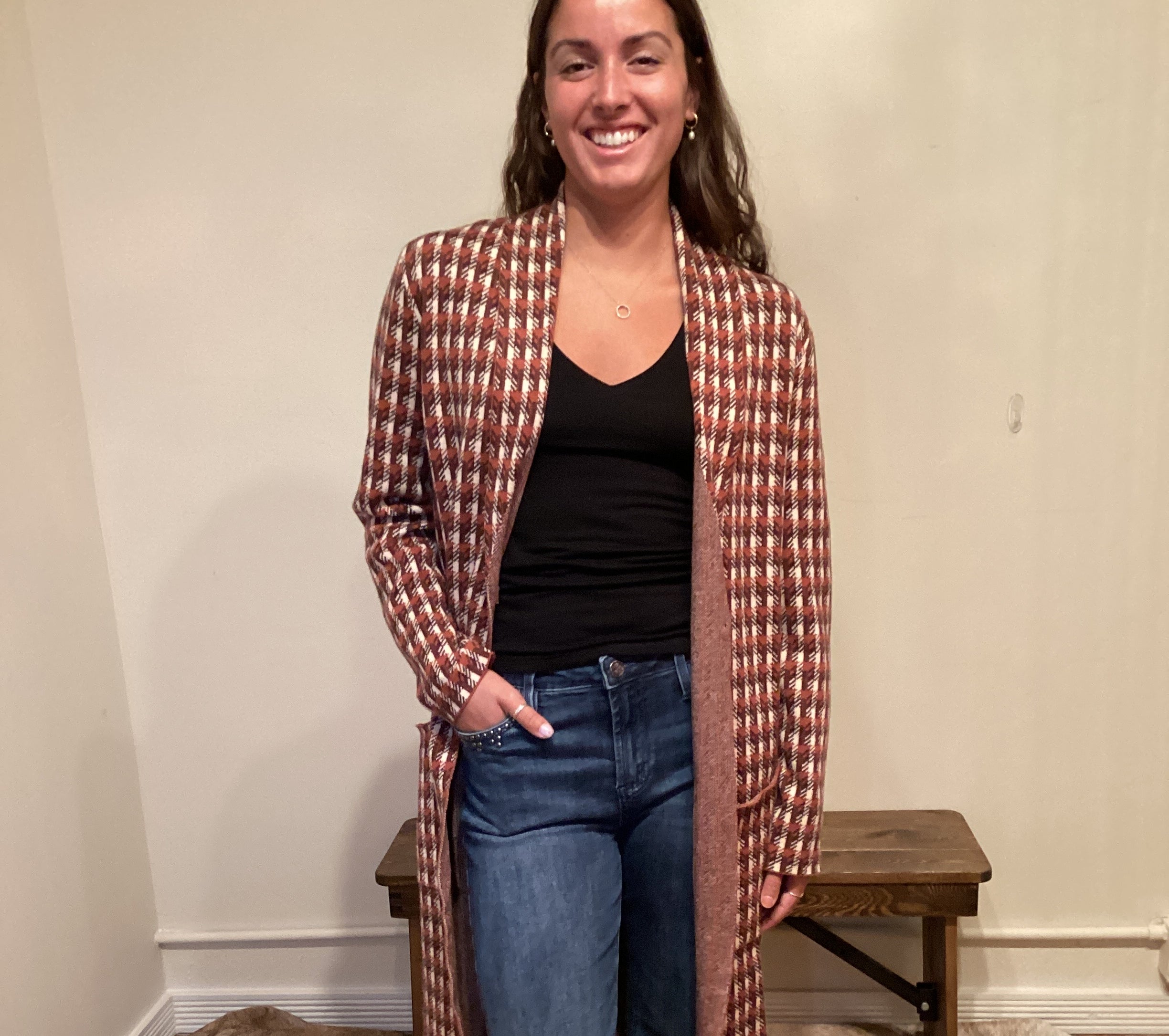 Rust and brown check pattern long cardigan with a single button and pockets hits mid shin
