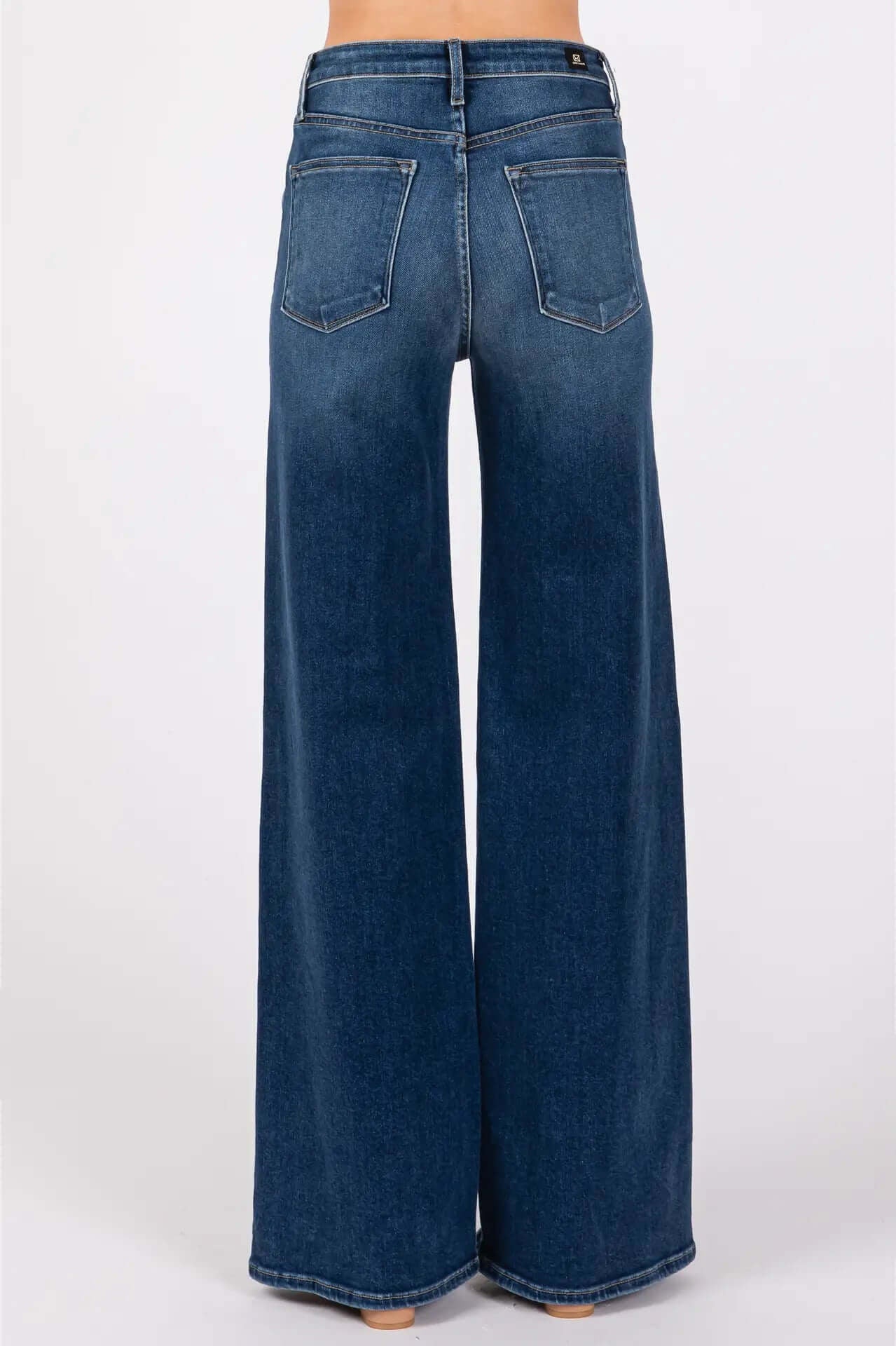 Dark denim jeans high rise back view