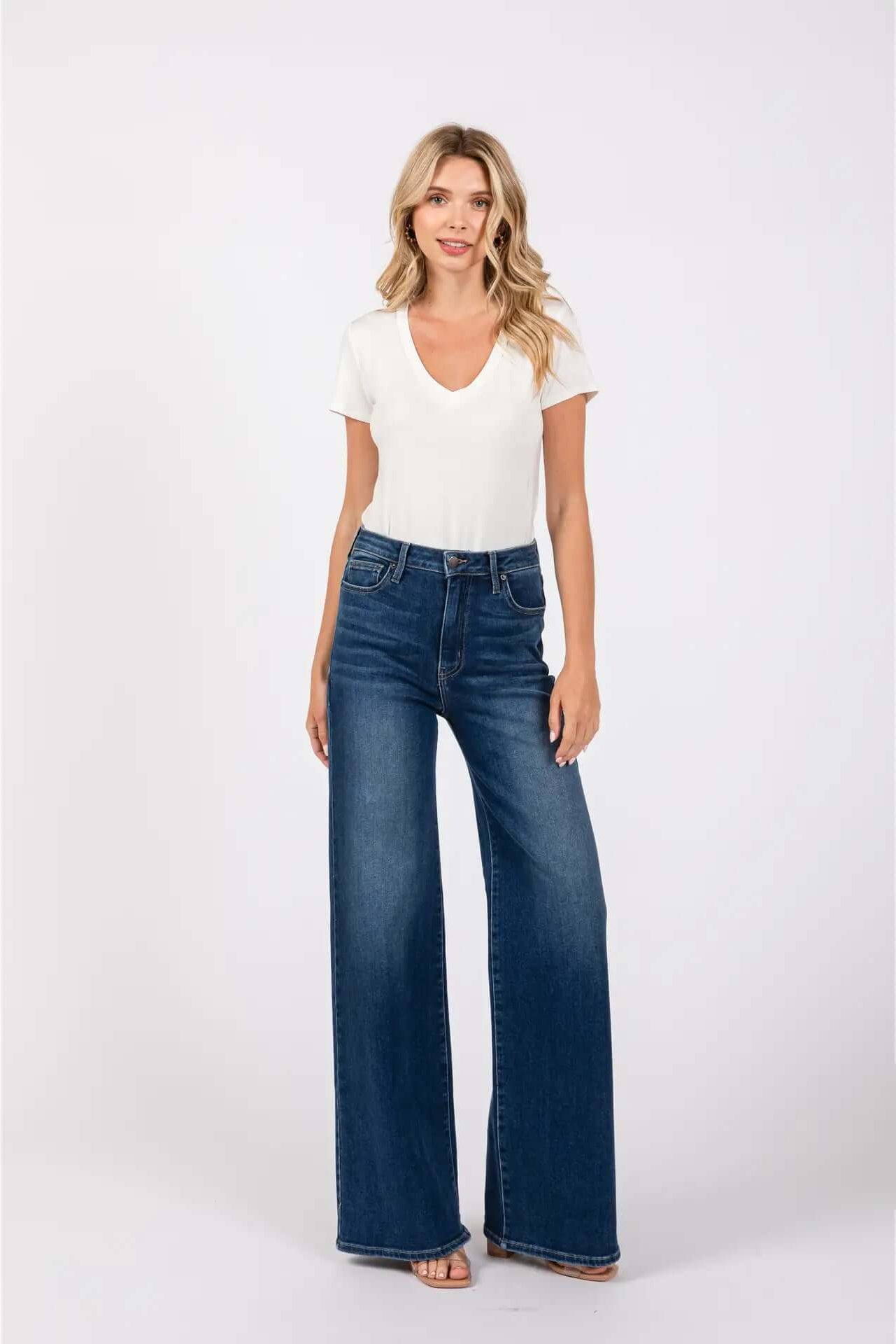 Women wearing wide leg high rise dark denim jeans!