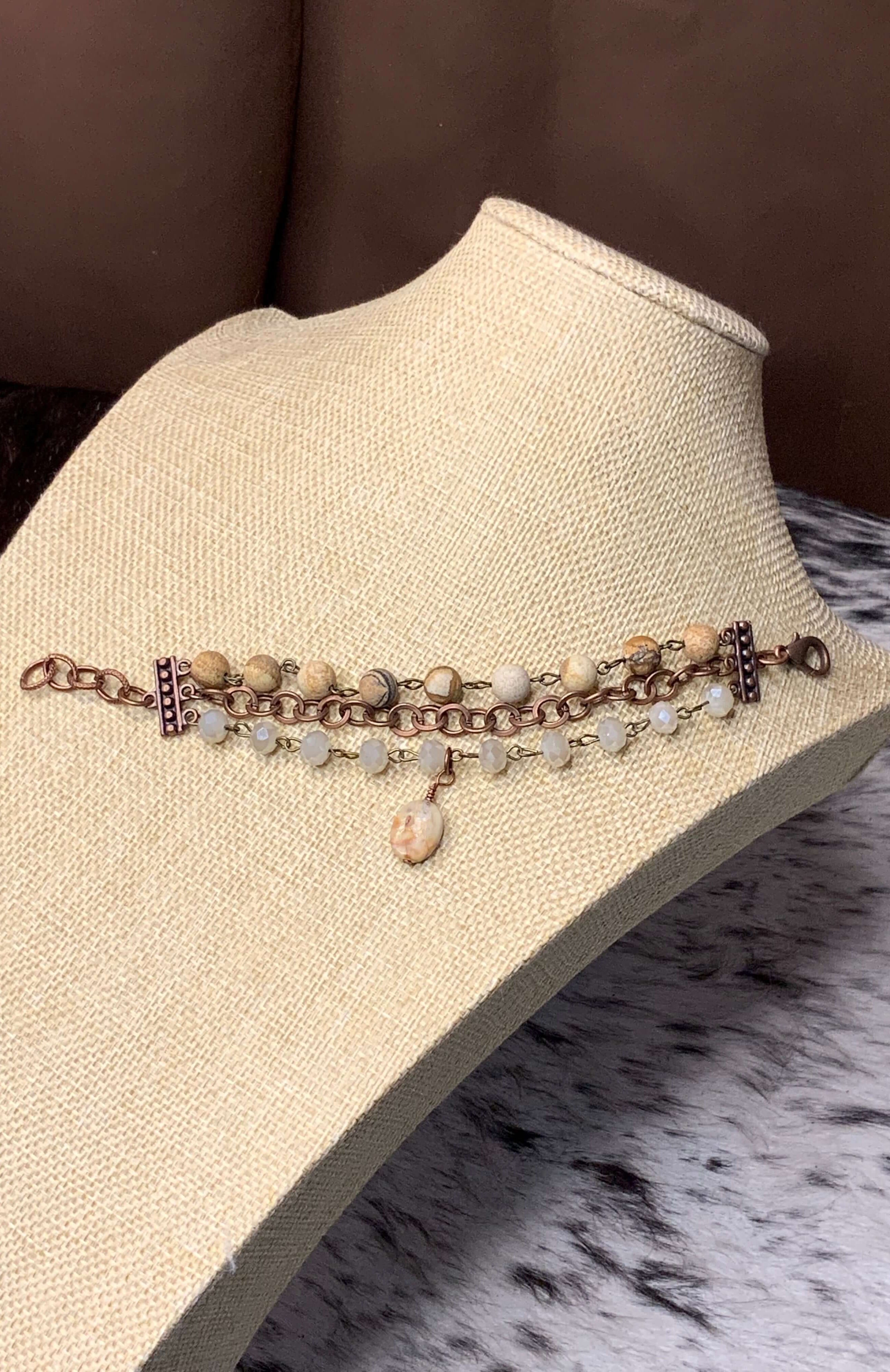 Close up of copper, Ivory Crystals, and Agate Stone Bracelet