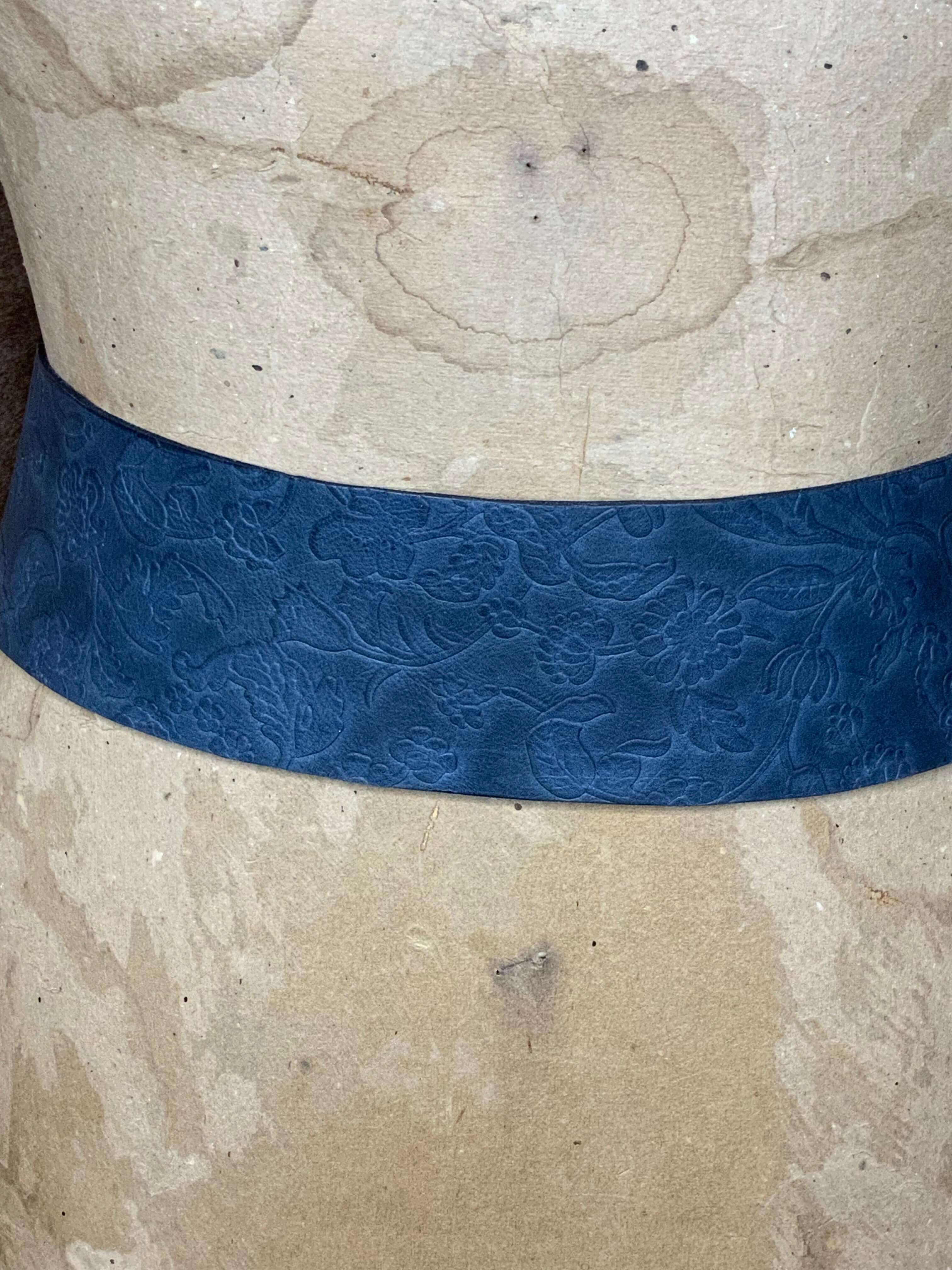Navy Floral embossed close up of leather 3" wide belt.
