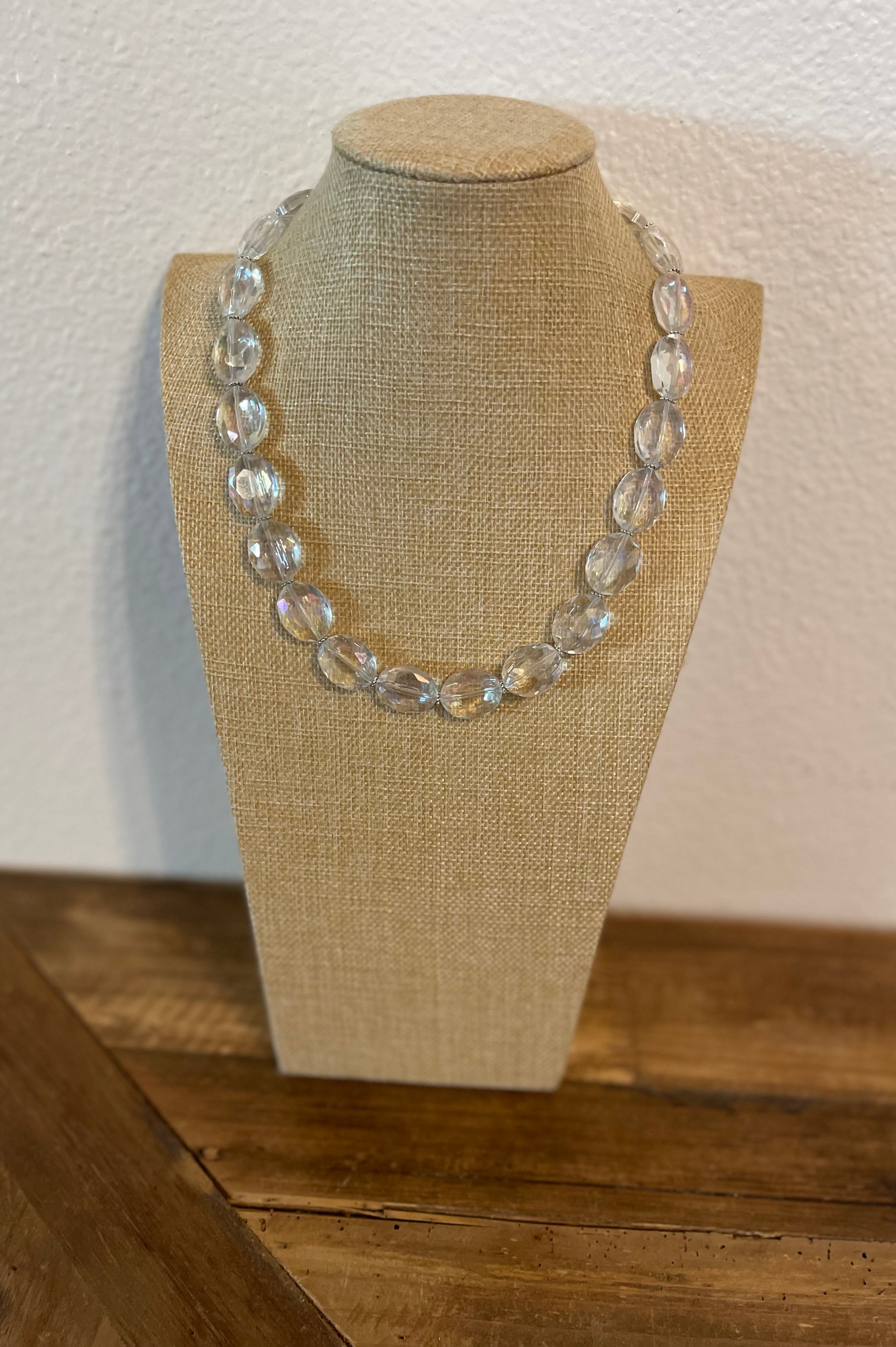 Clear crystal necklace with very simple silver spacers.