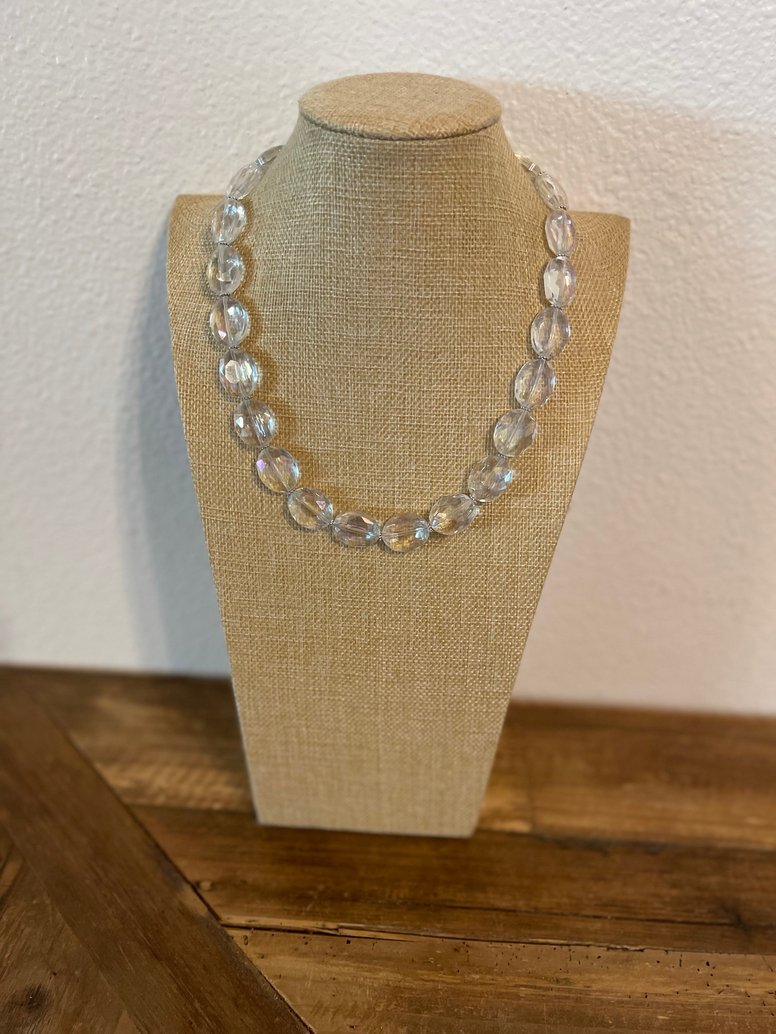 Clear crystal necklace with very simple silver spacers.