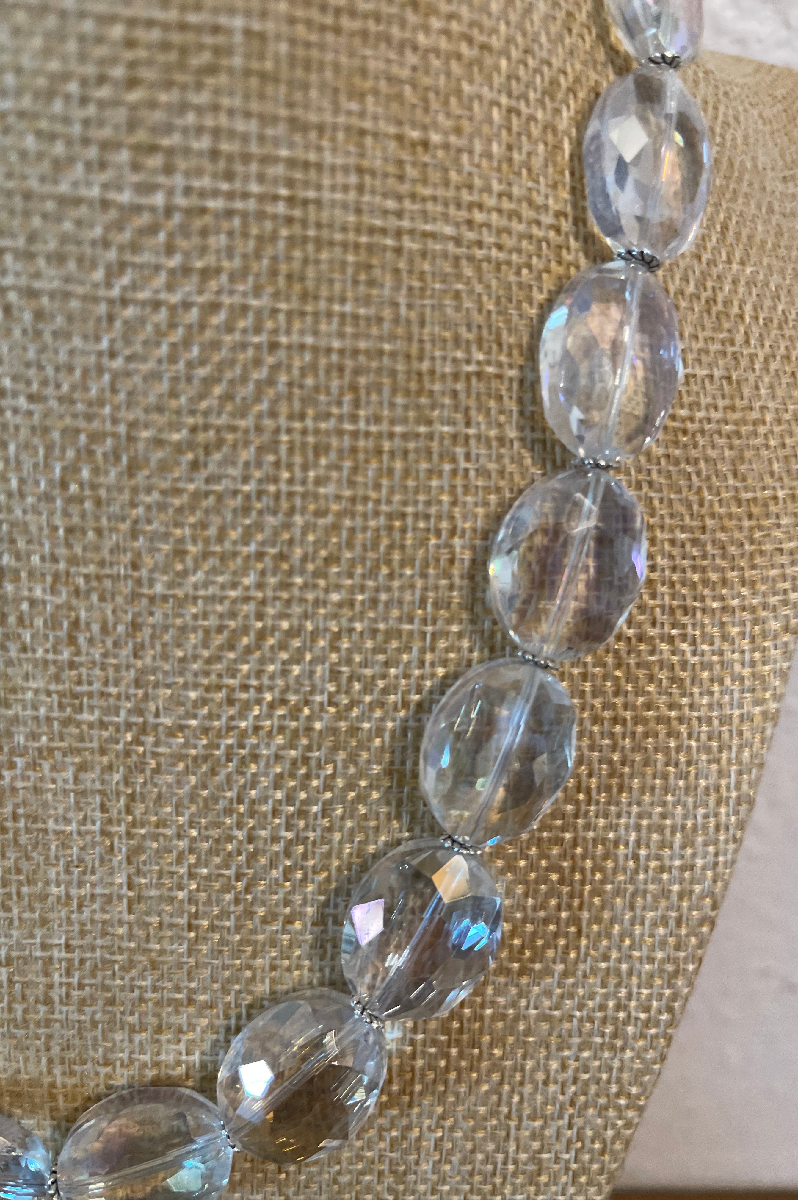 Clear crystal necklace with very simple silver spacers.