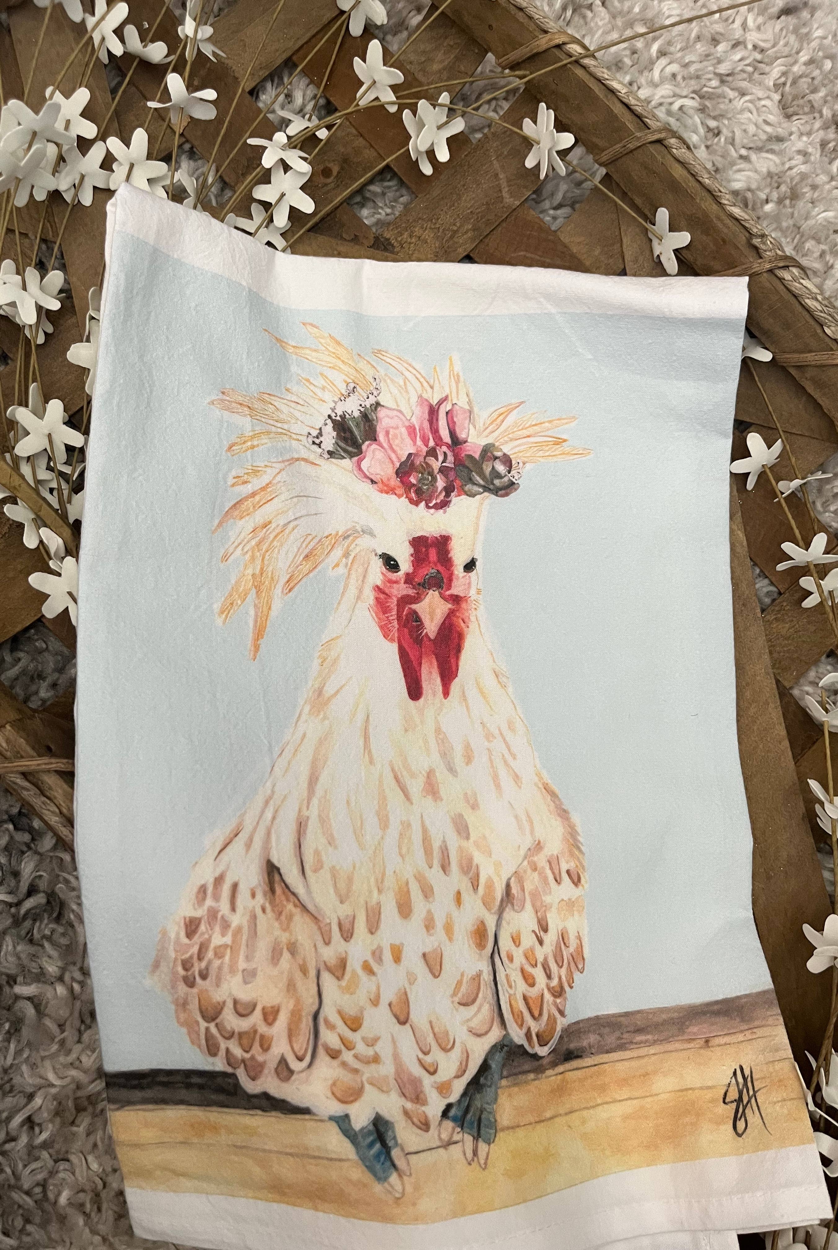 Towel with a rooster design on a decorative background