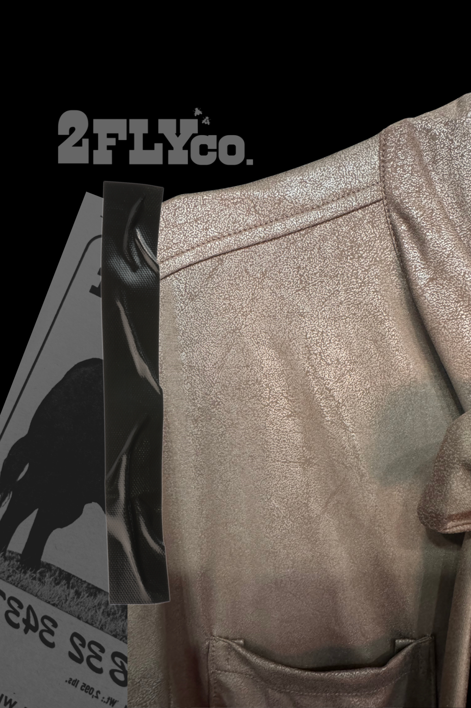 Brown faux leather up close view of fabric with a visible brand logo on a black background