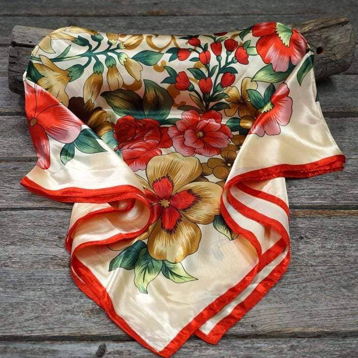 Floral patterned scarf on a wooden surface