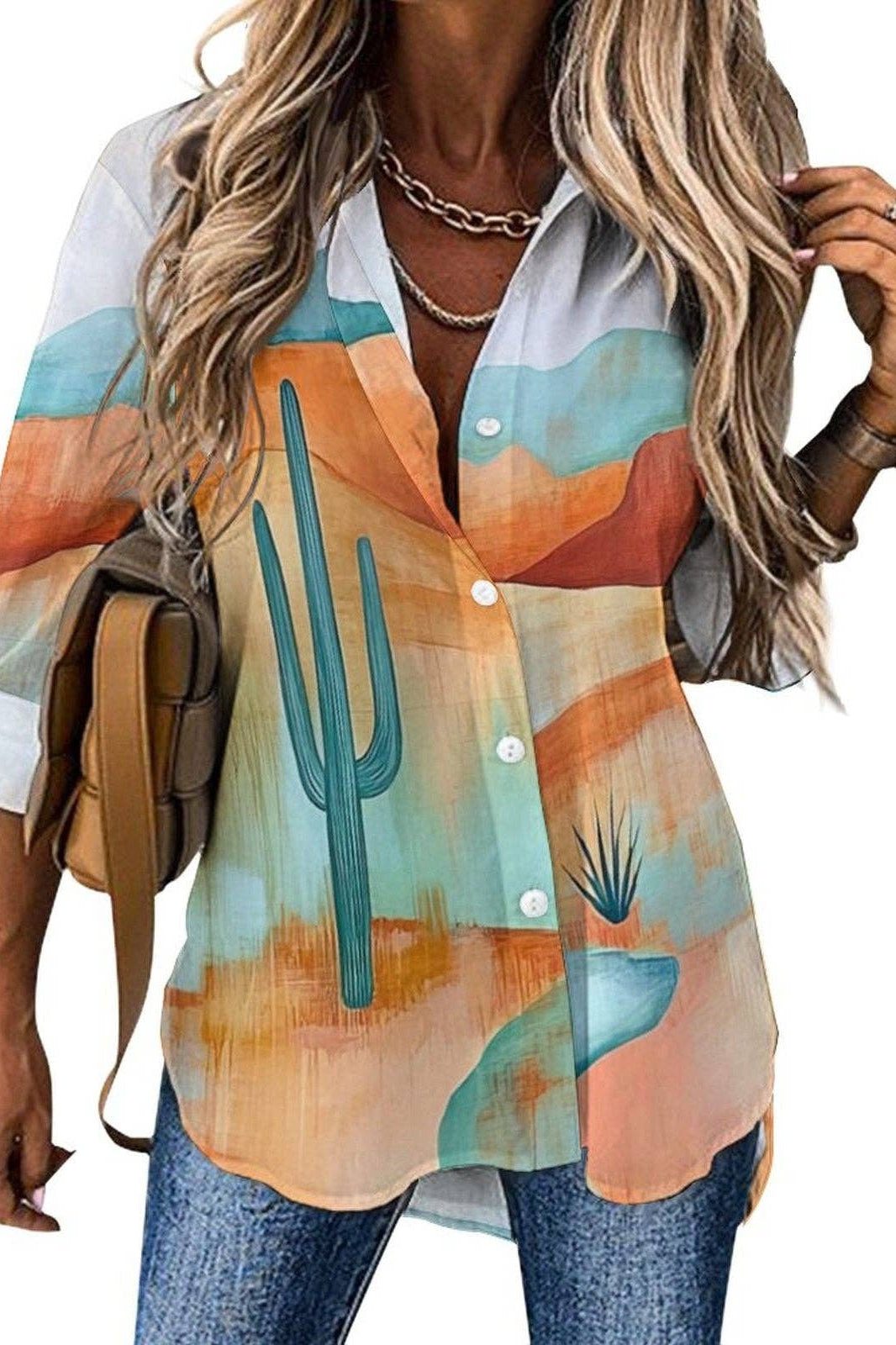 Woman wearing a colorful shirt with cactus design, holding a backpack.
