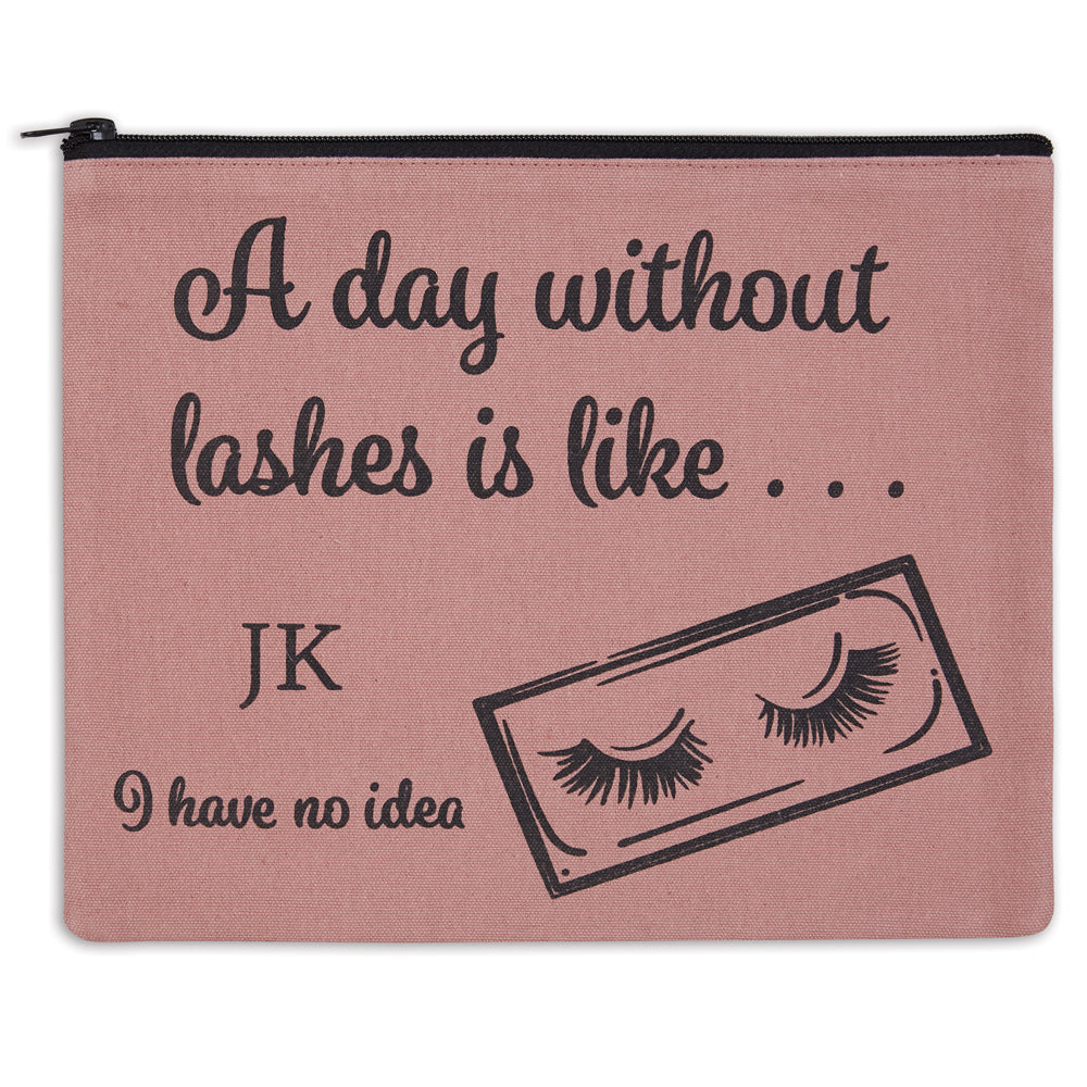 Pink pouch with eyelash design and humorous text on a white background