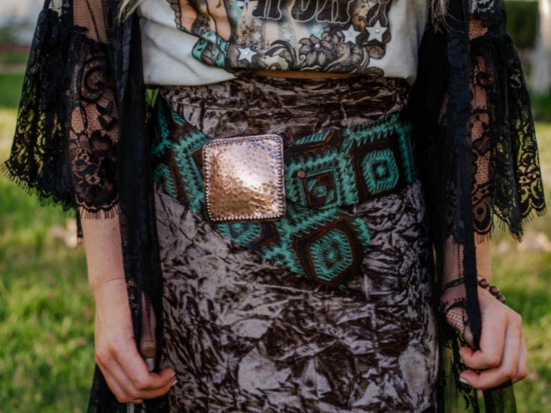 Handmade leather accessories and artisan-made jewelry by owner Charlyn Pacheco, with a Western-inspired aesthetic.