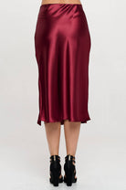 Back Burgundy satin skirt with a front slit, elastic waist.  