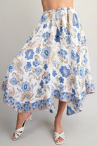 Floral patterned skirt with blue flowers on a plain background