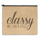 Beige pouch with 'classy but I cuss a little' text on a white background