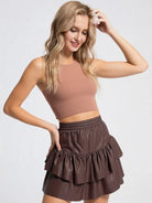 Dakota faux leather ruffle mini skirt—front view, elastic waist