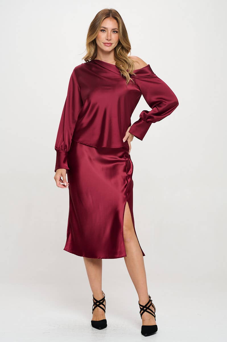 Burgundy satin skirt with a front slit, elastic waist.  With Satin top that matches
