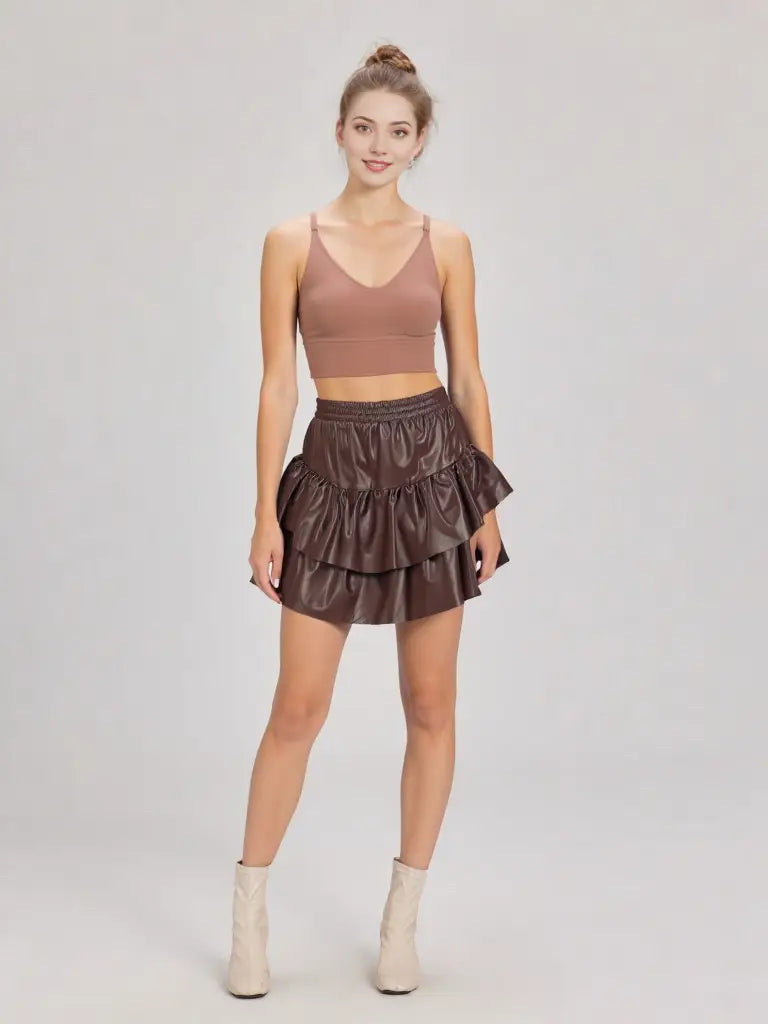 Dakota faux leather ruffle mini skirt—front view, elastic waist