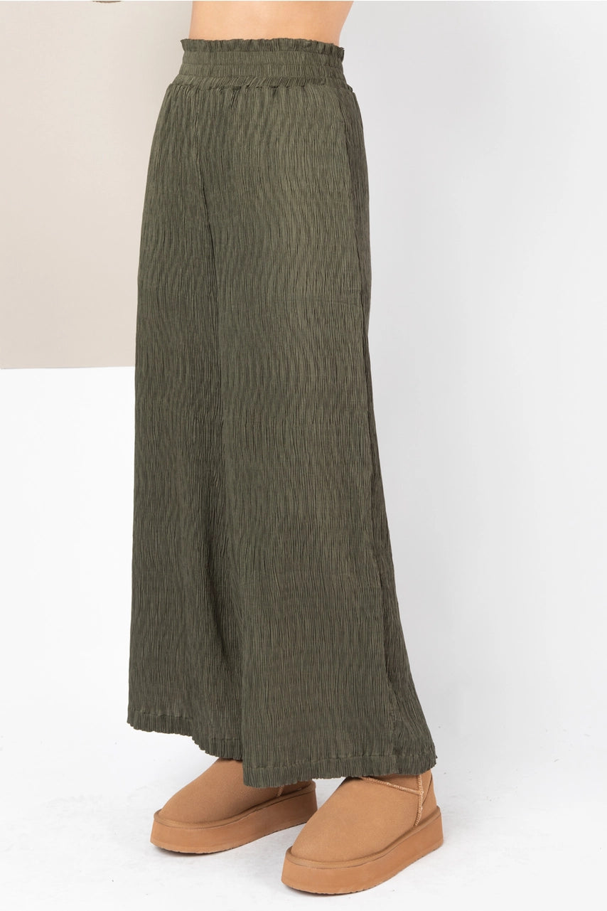 Side view of high-waisted wide leg in textured fabric
