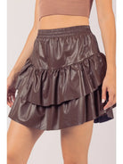 Dakota faux leather ruffle mini skirt—front view, elastic waist