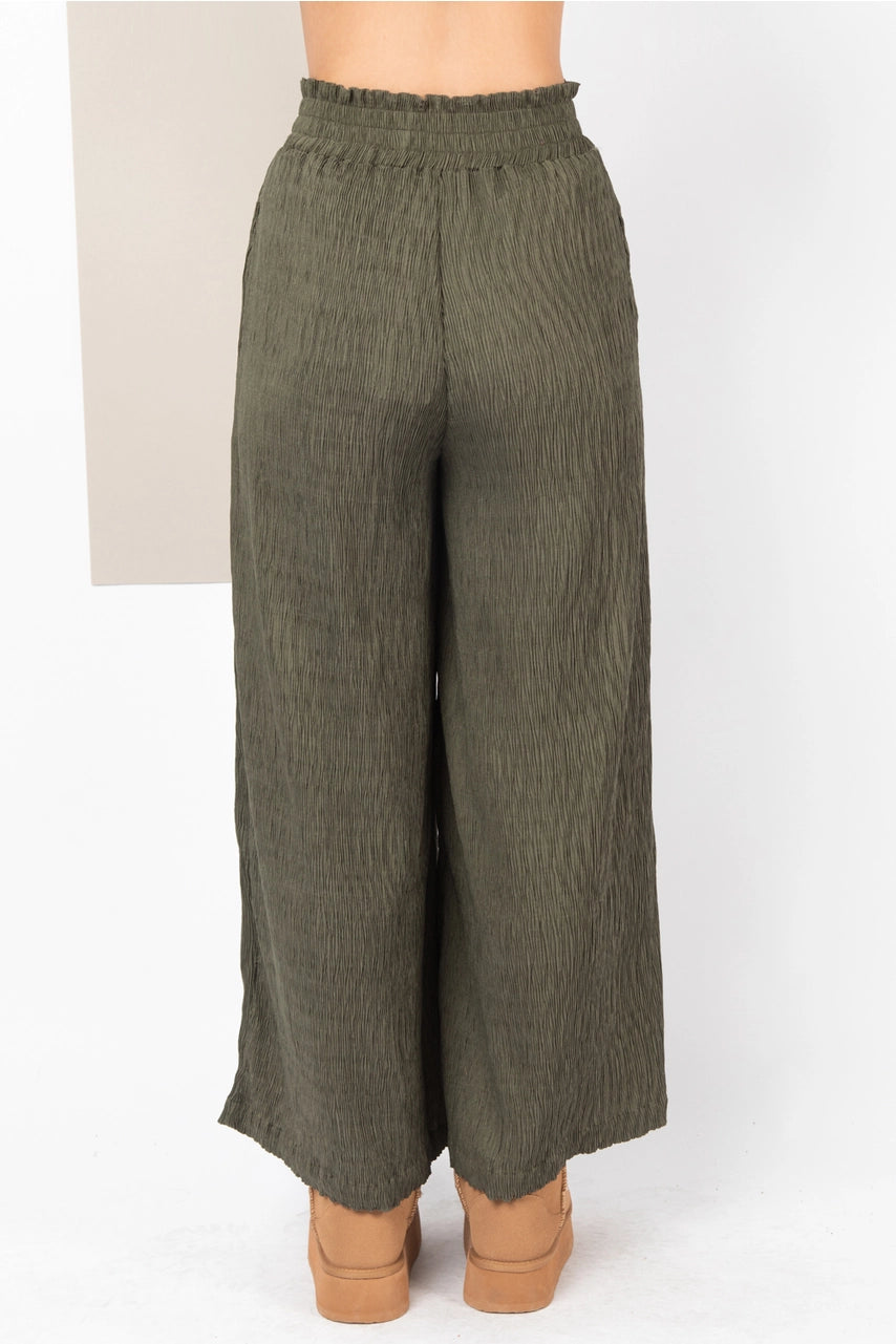 Back view showing pull-on waistband and in-seam pockets”
