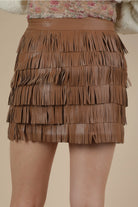 Brown faux leather fringe mini skirt, back view showing layered tiers