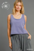 cropped tank on a light denim blue  