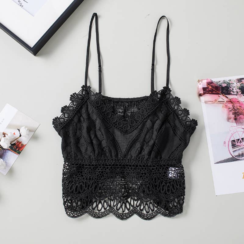 Black lace cami laying on a table