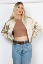 Lightweight satin bomber jacket featuring a relaxed fit, full front zipper, elastic cuffs, fully lined construction, utility sleeve pocket, and side pockets for polished everyday layering.