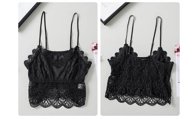 Black lace bralette laying on a table