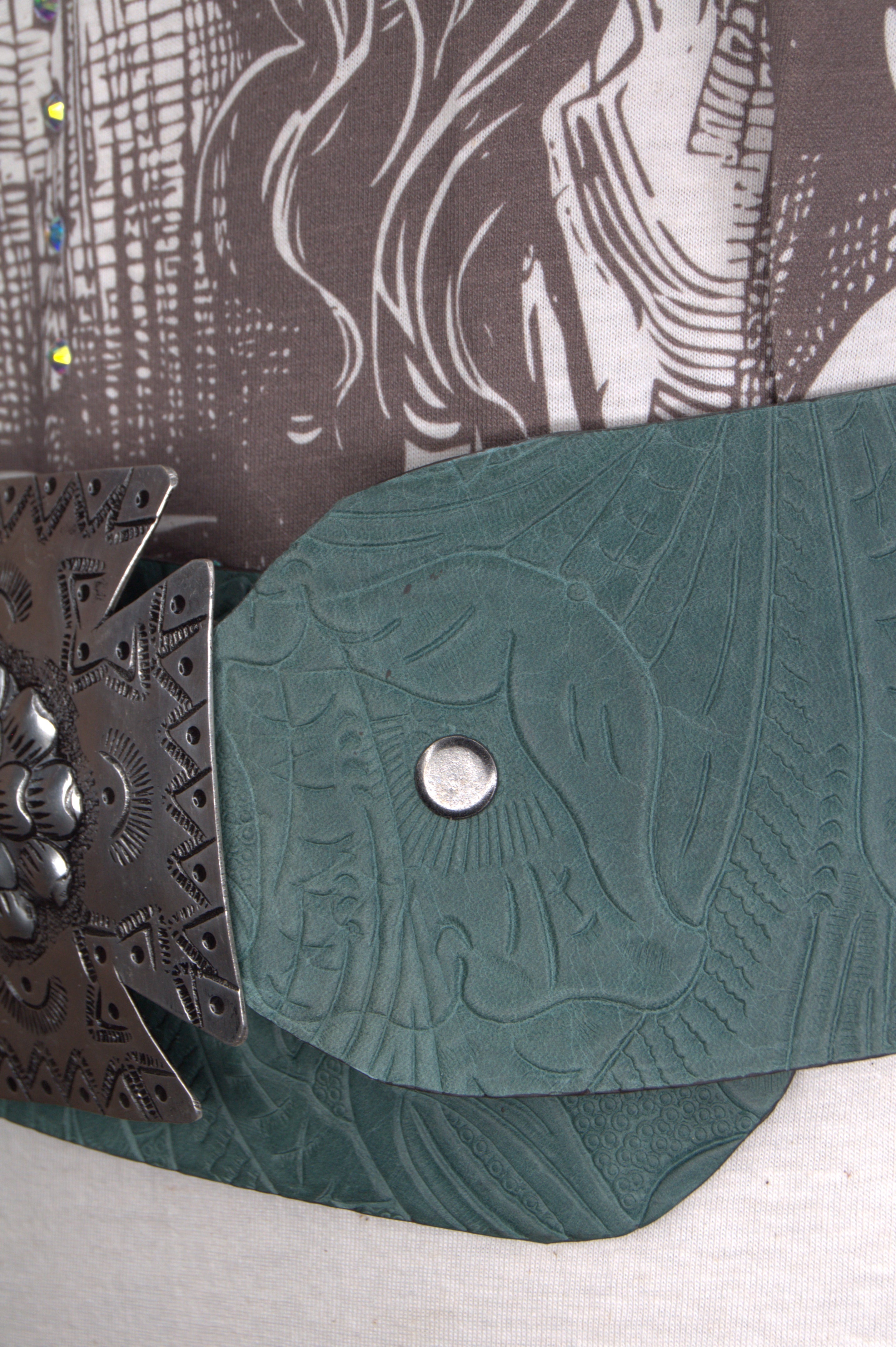 Handcrafted leather hip belt in aqua