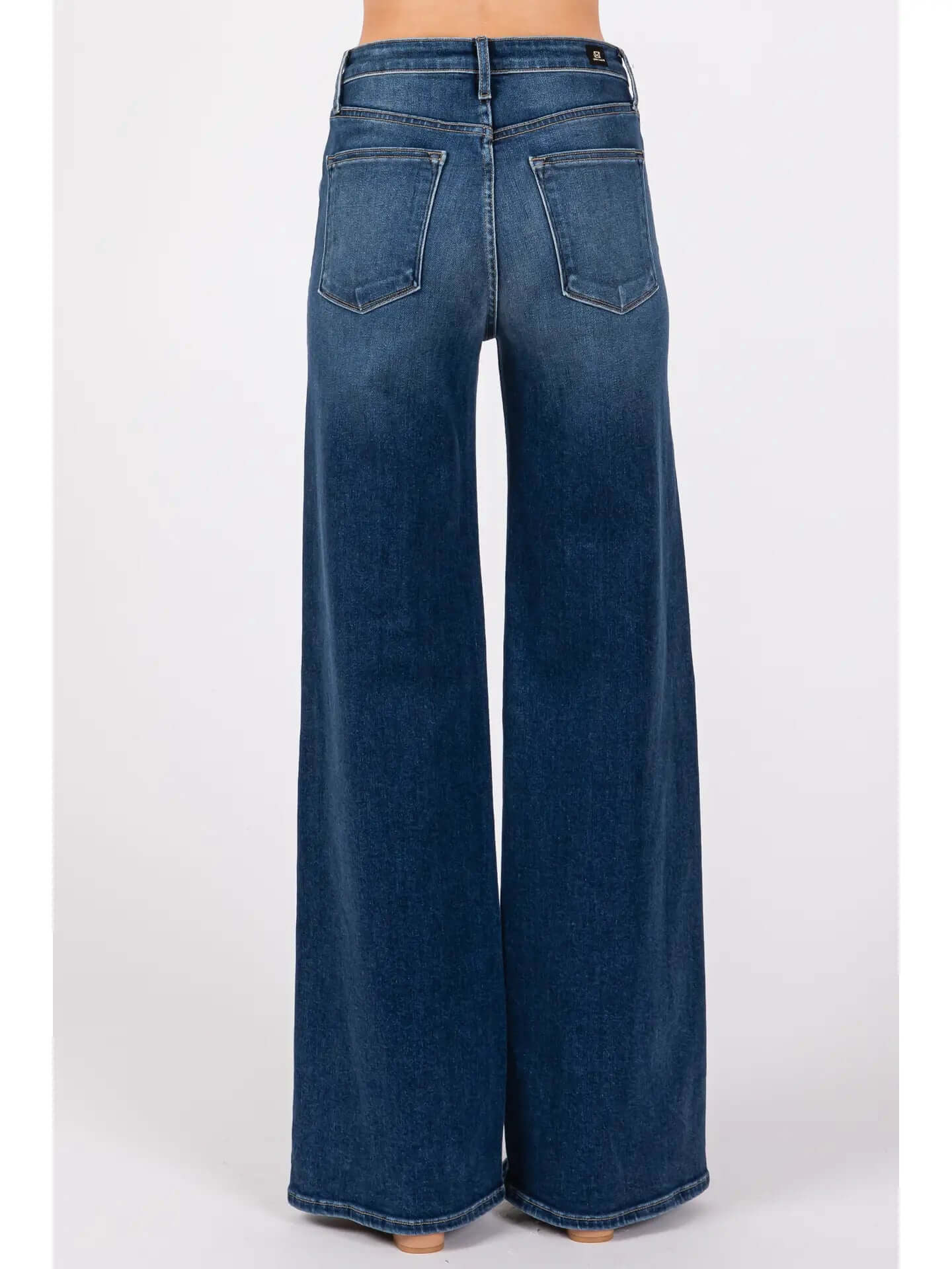 Dark denim jeans high rise back view