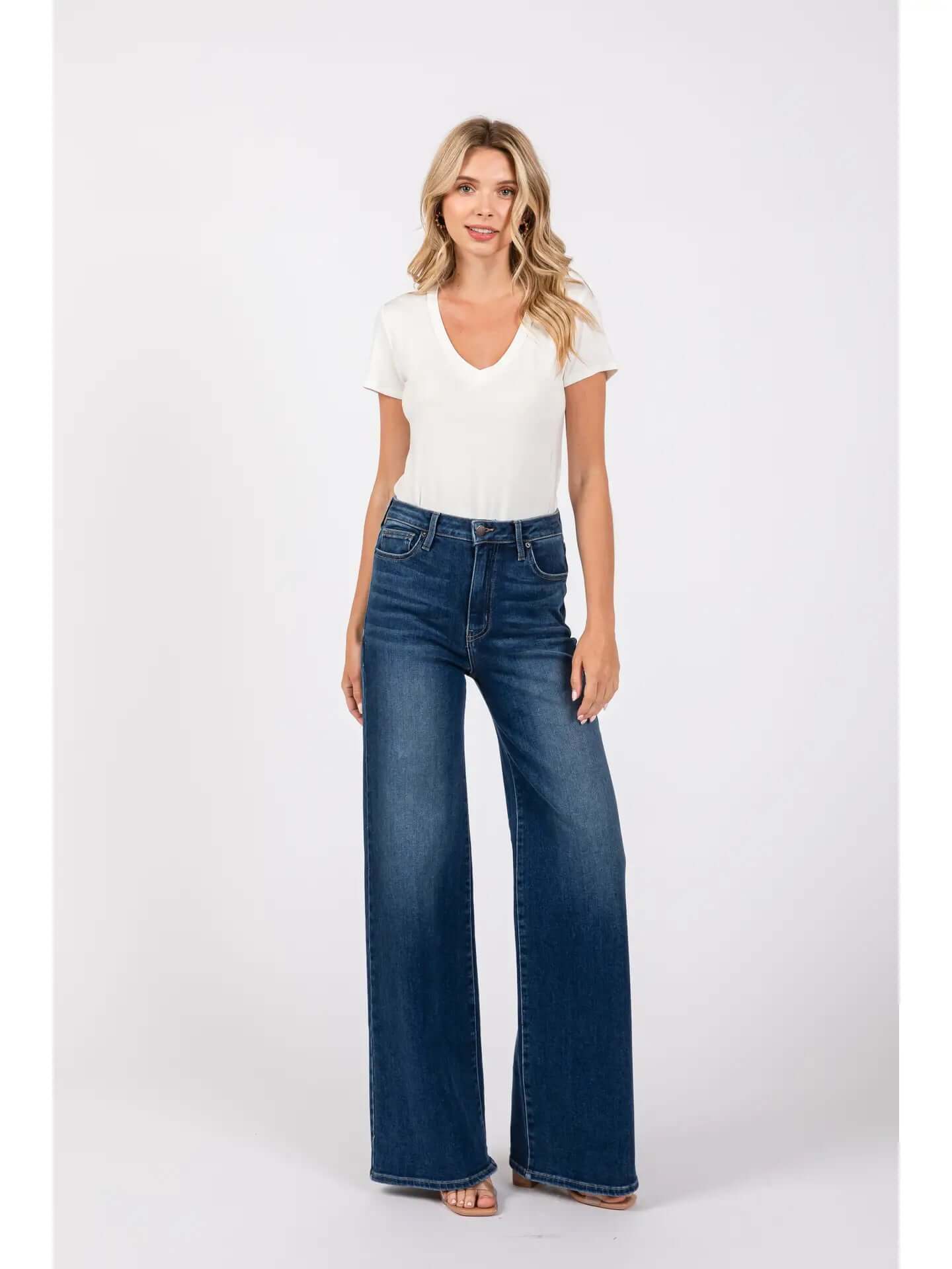 Women wearing wide leg high rise dark denim jeans!